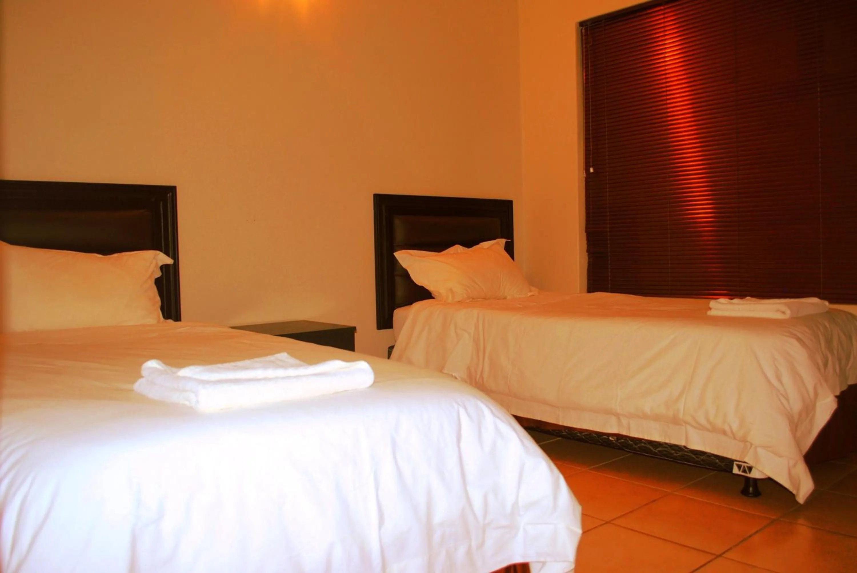 Bedroom in Palm Valley Inn And Day Spa