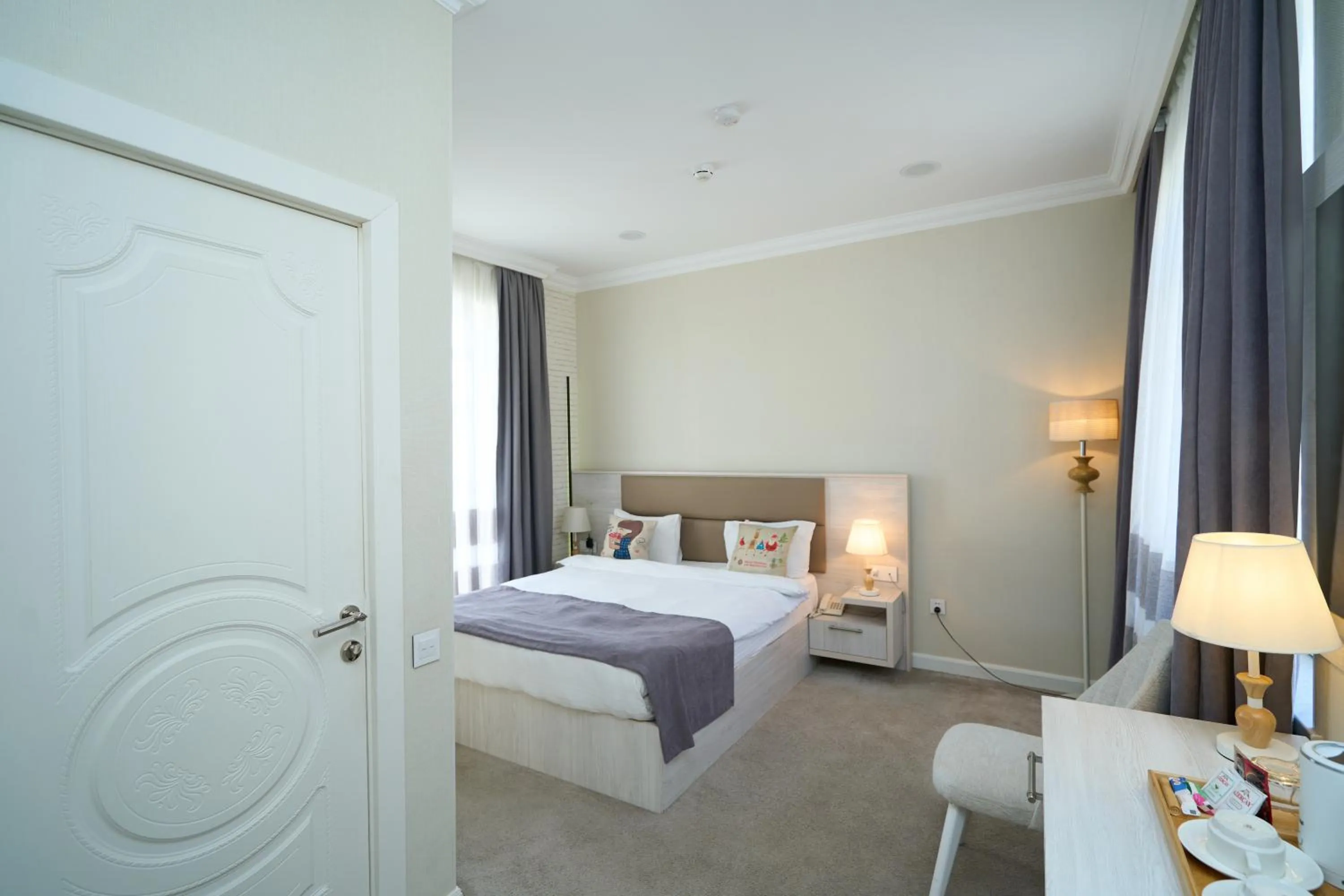 Bed in Zimmer Boutique Hotel