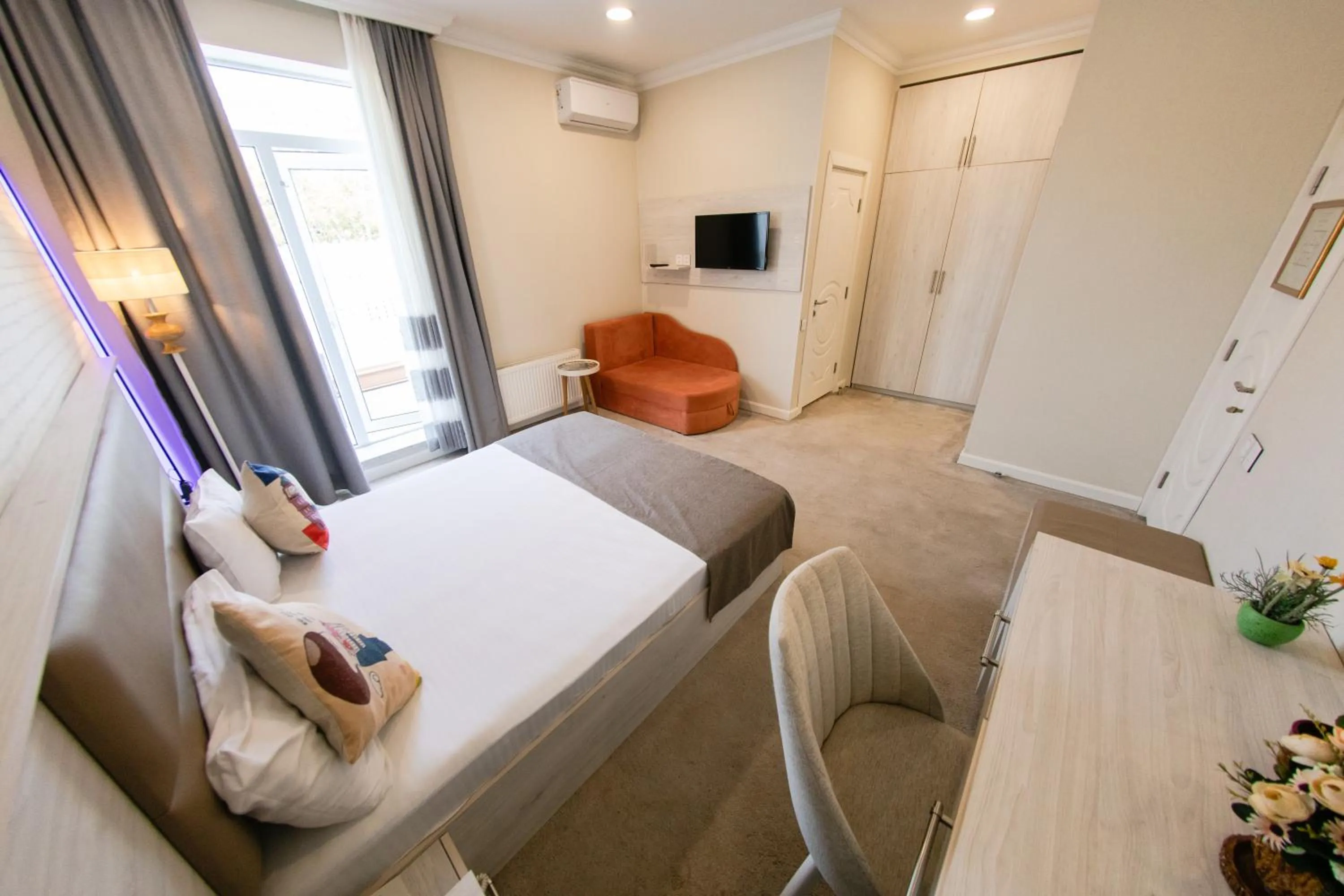 Bed in Zimmer Boutique Hotel