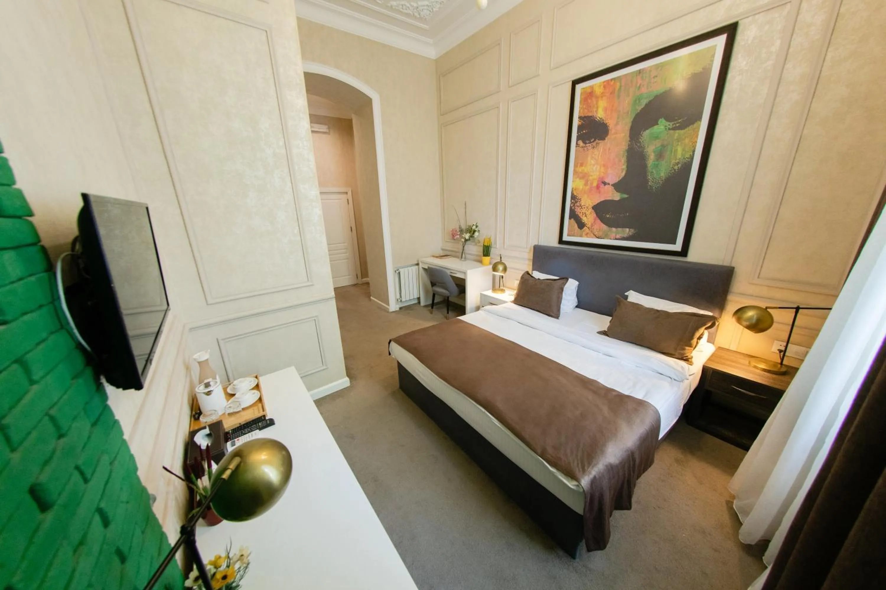 Bed in Zimmer Boutique Hotel