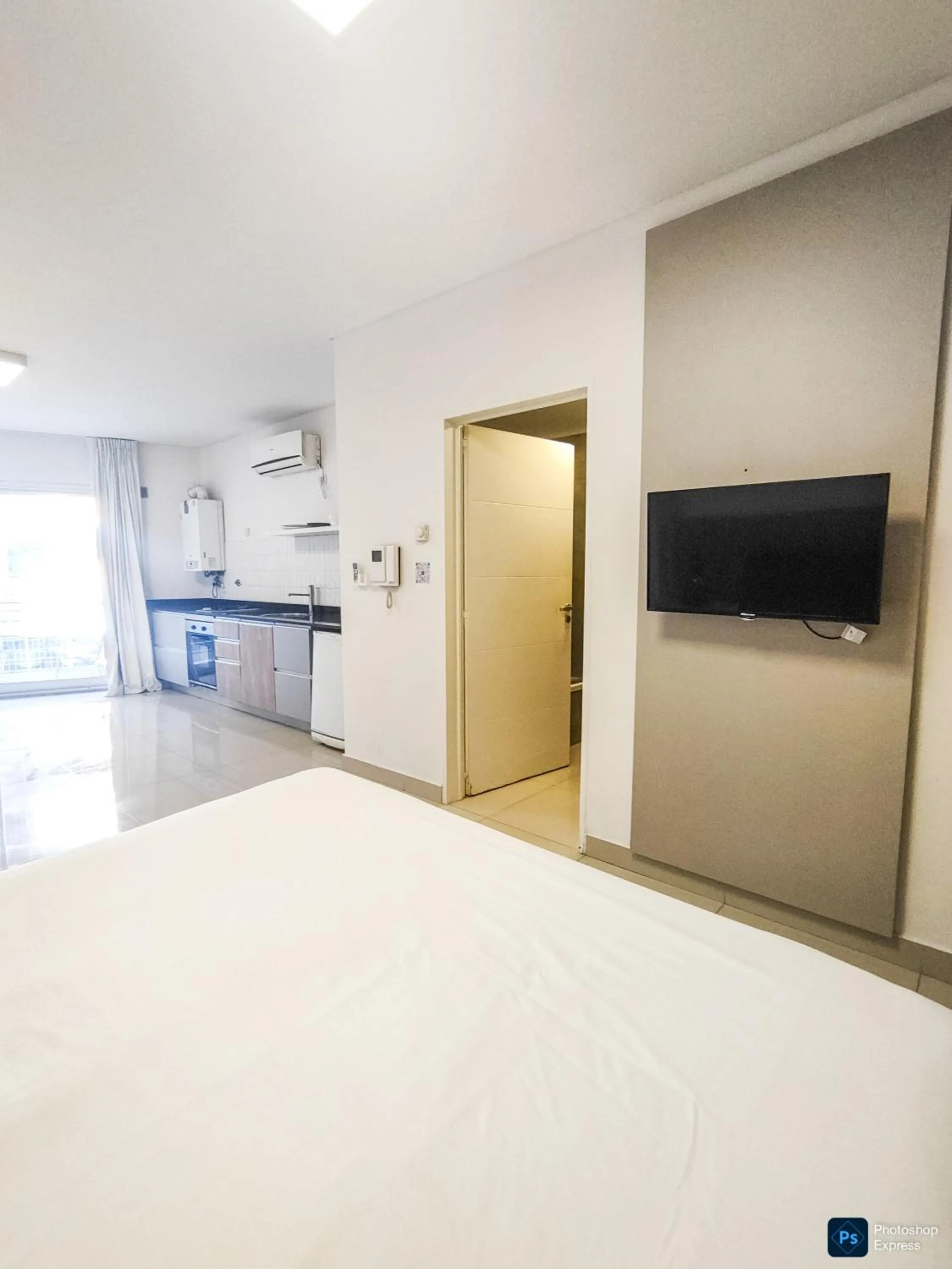 TV and multimedia, Bed in Báltico Suites