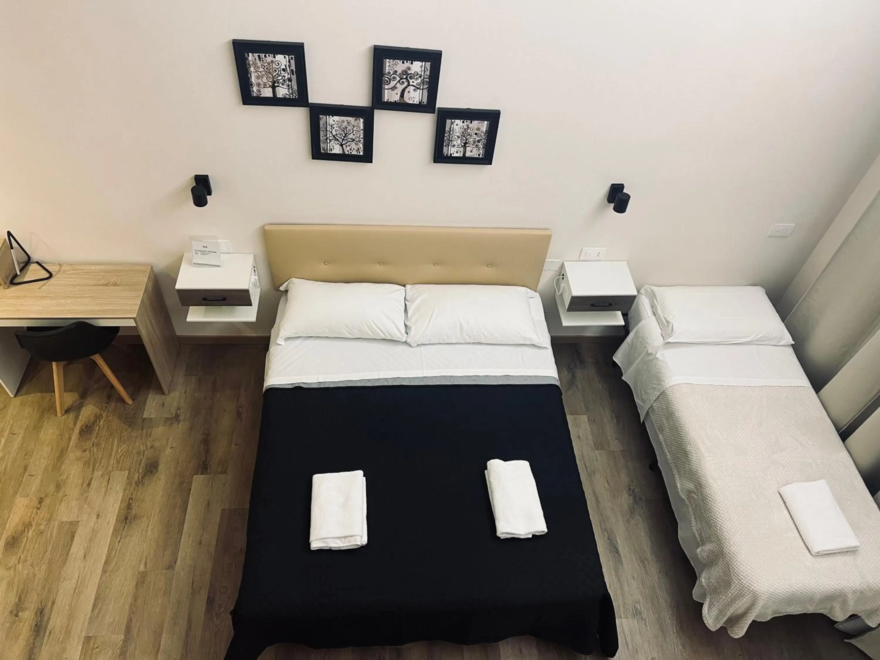 Bed in Il Galileo Rooms