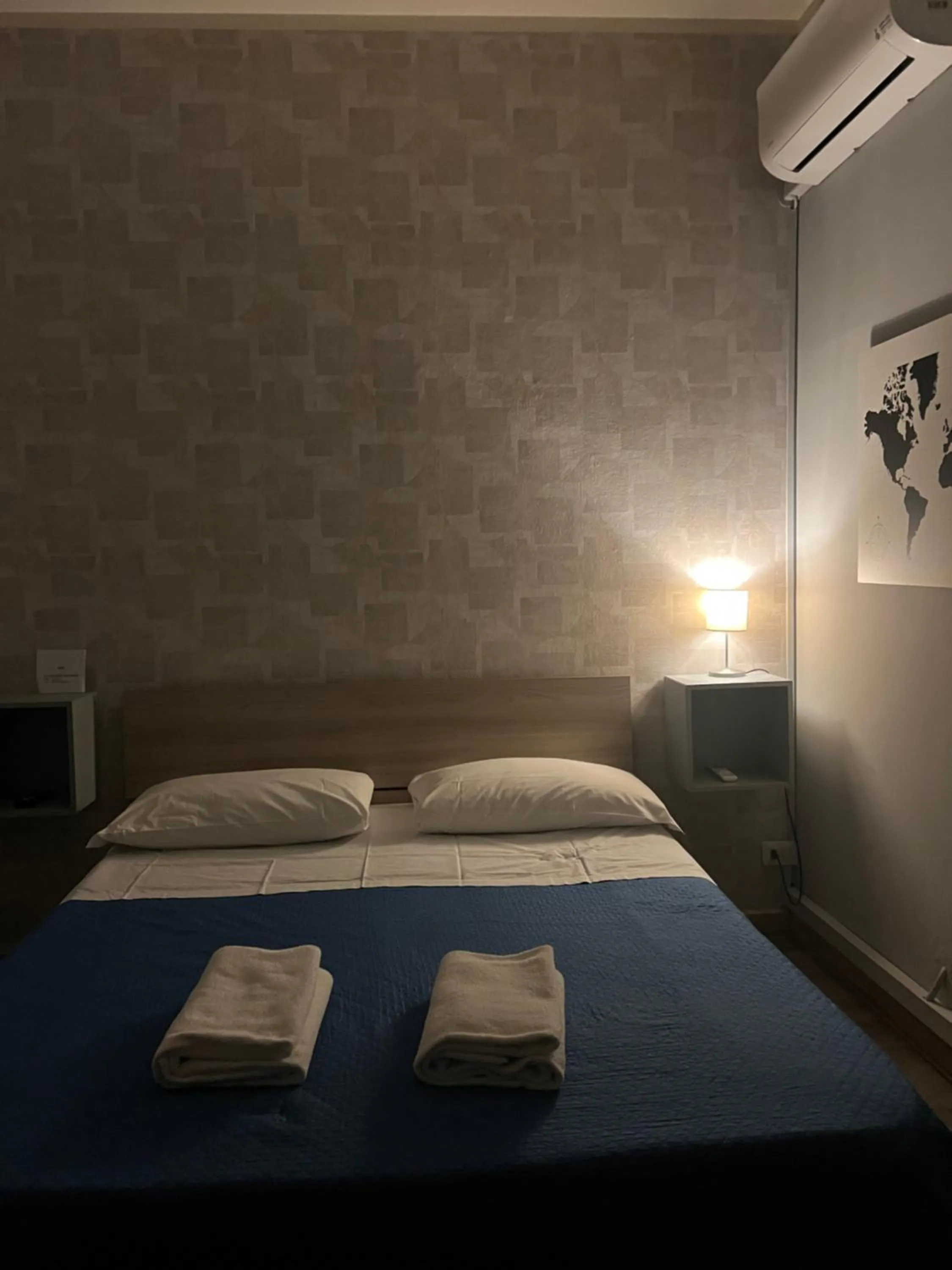 Bed in Il Galileo Rooms