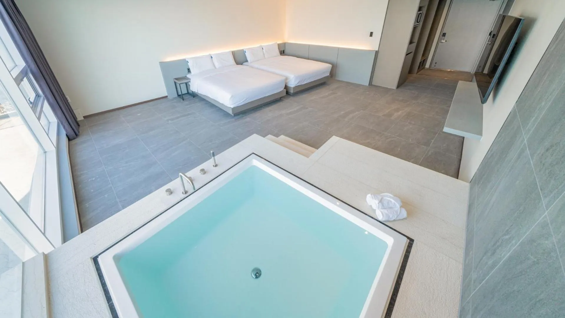 Bed in Sharp & Flat Hotel