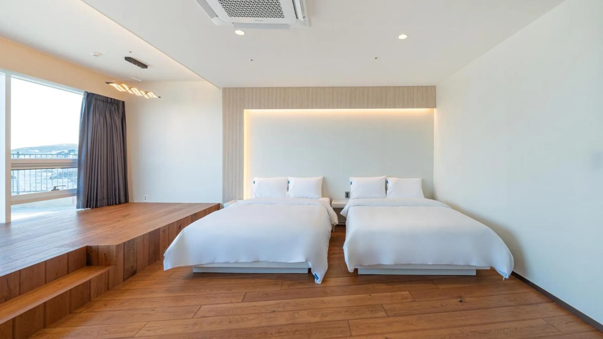 Bed in Sharp & Flat Hotel