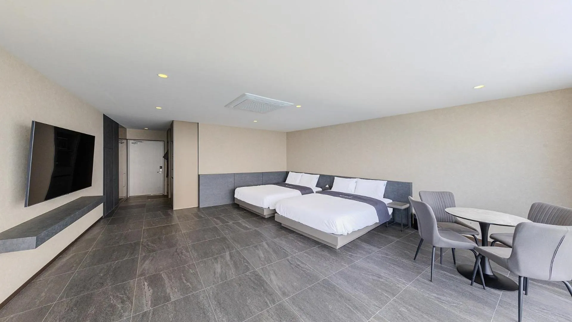 Bed in Sharp & Flat Hotel