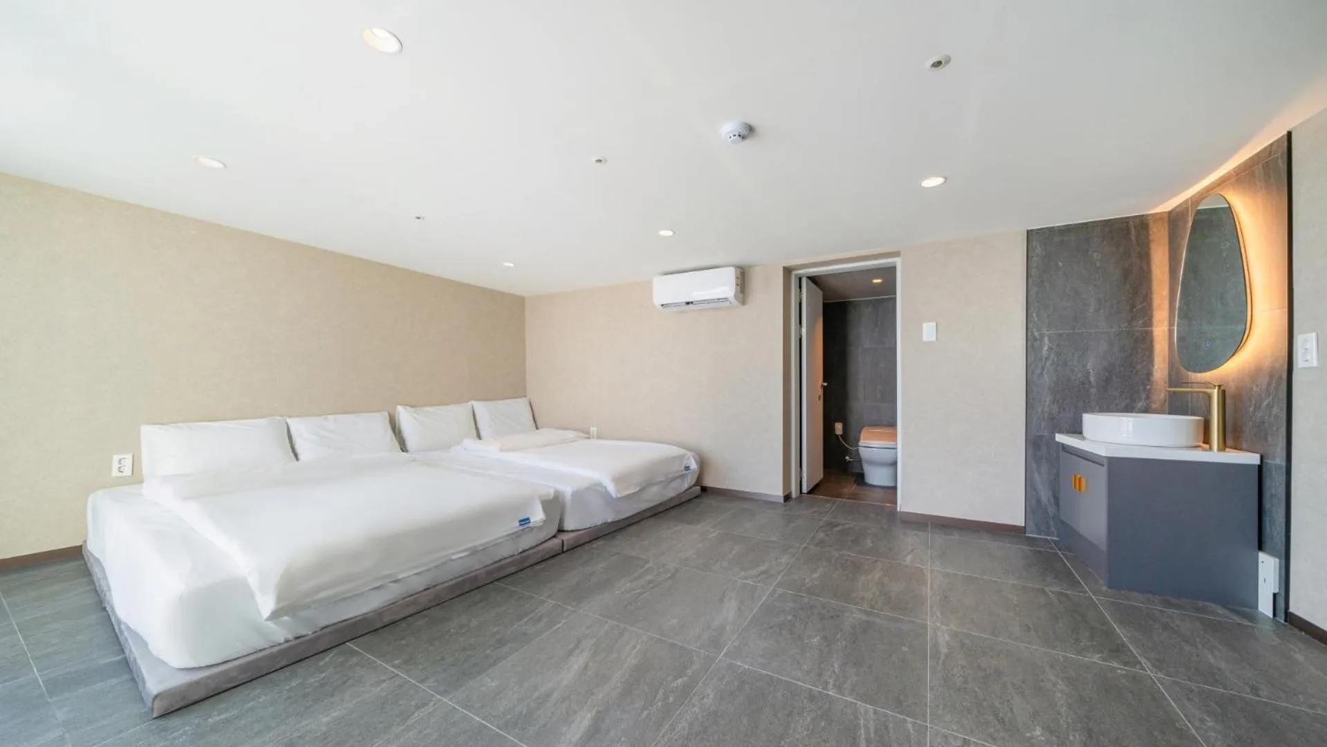 Bed in Sharp & Flat Hotel