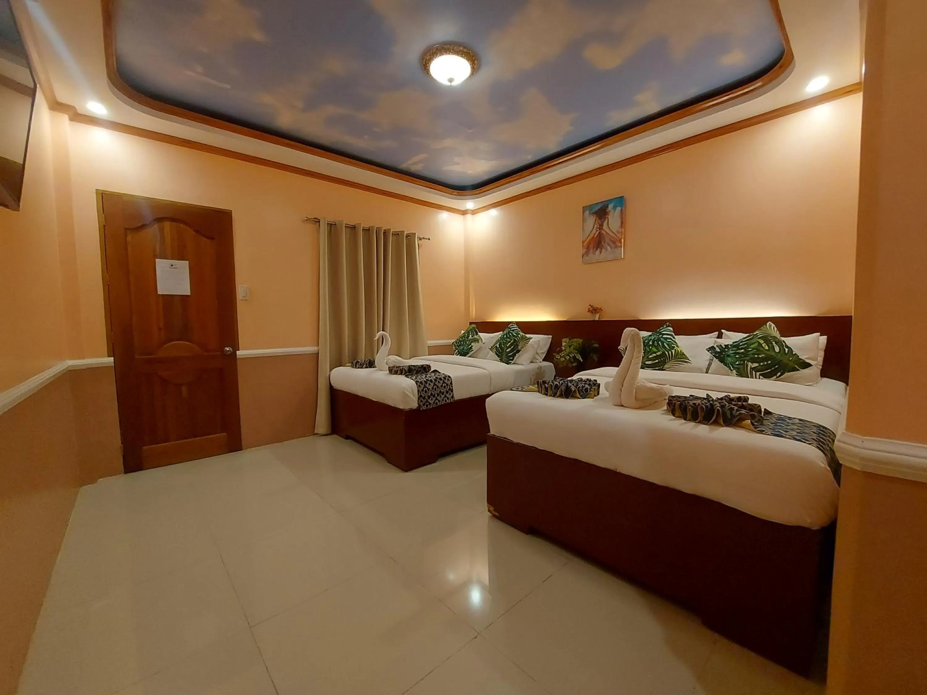 Photo of the whole room, Bed in New Village Lodge