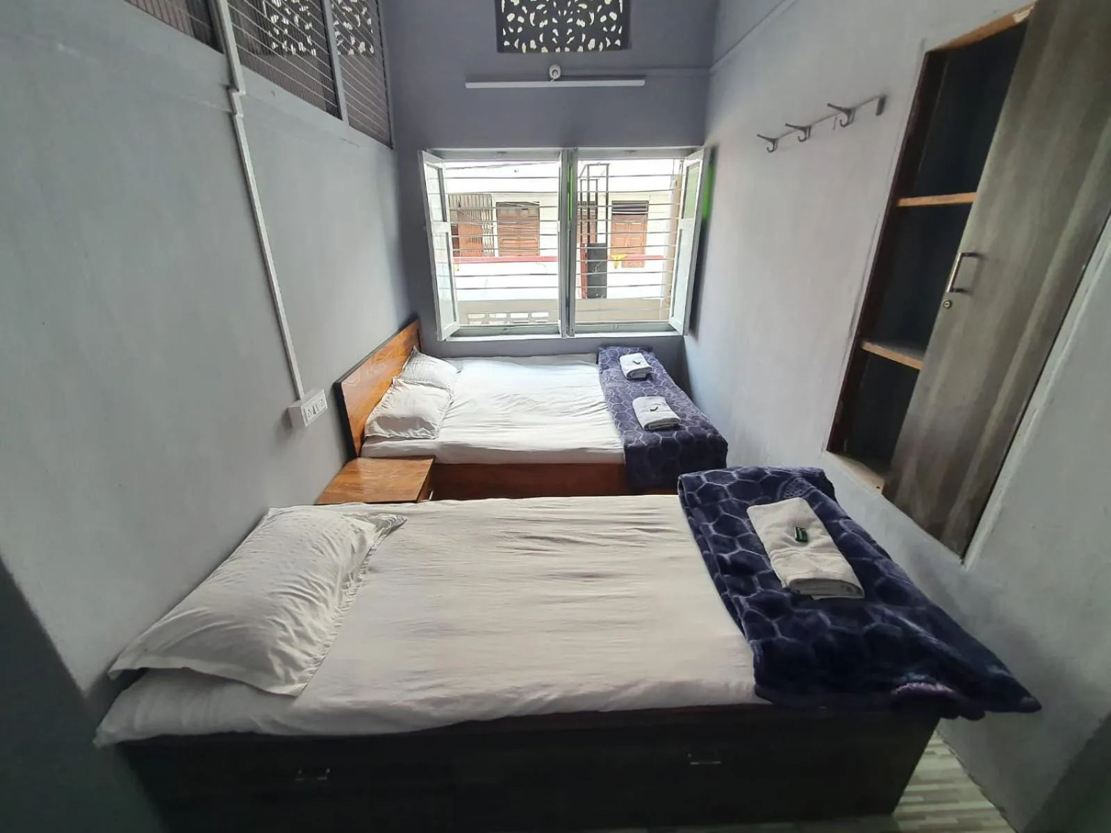 Bed in Hotel Family Stay Beside Railway Station