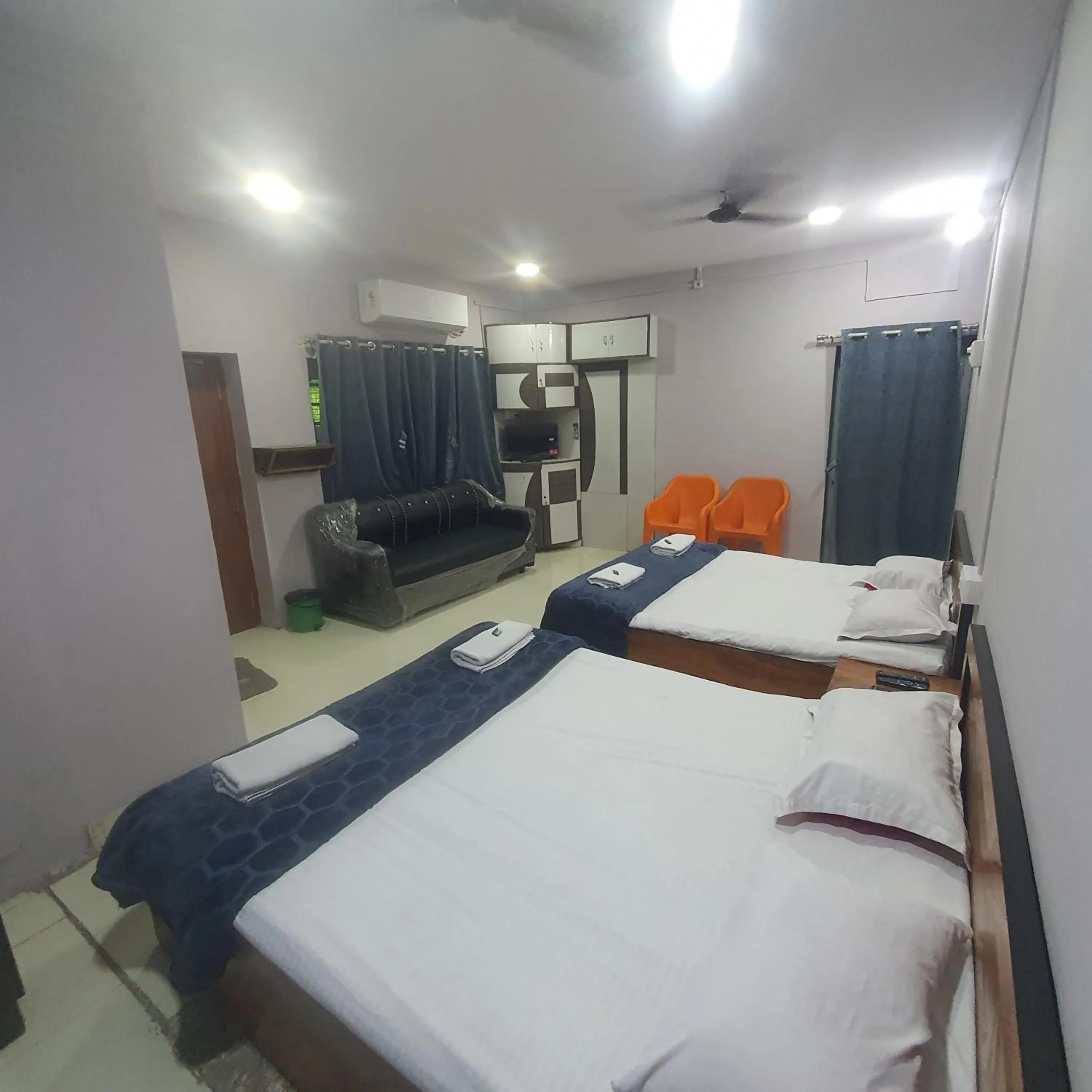 Bed in Hotel Family Stay Beside Railway Station