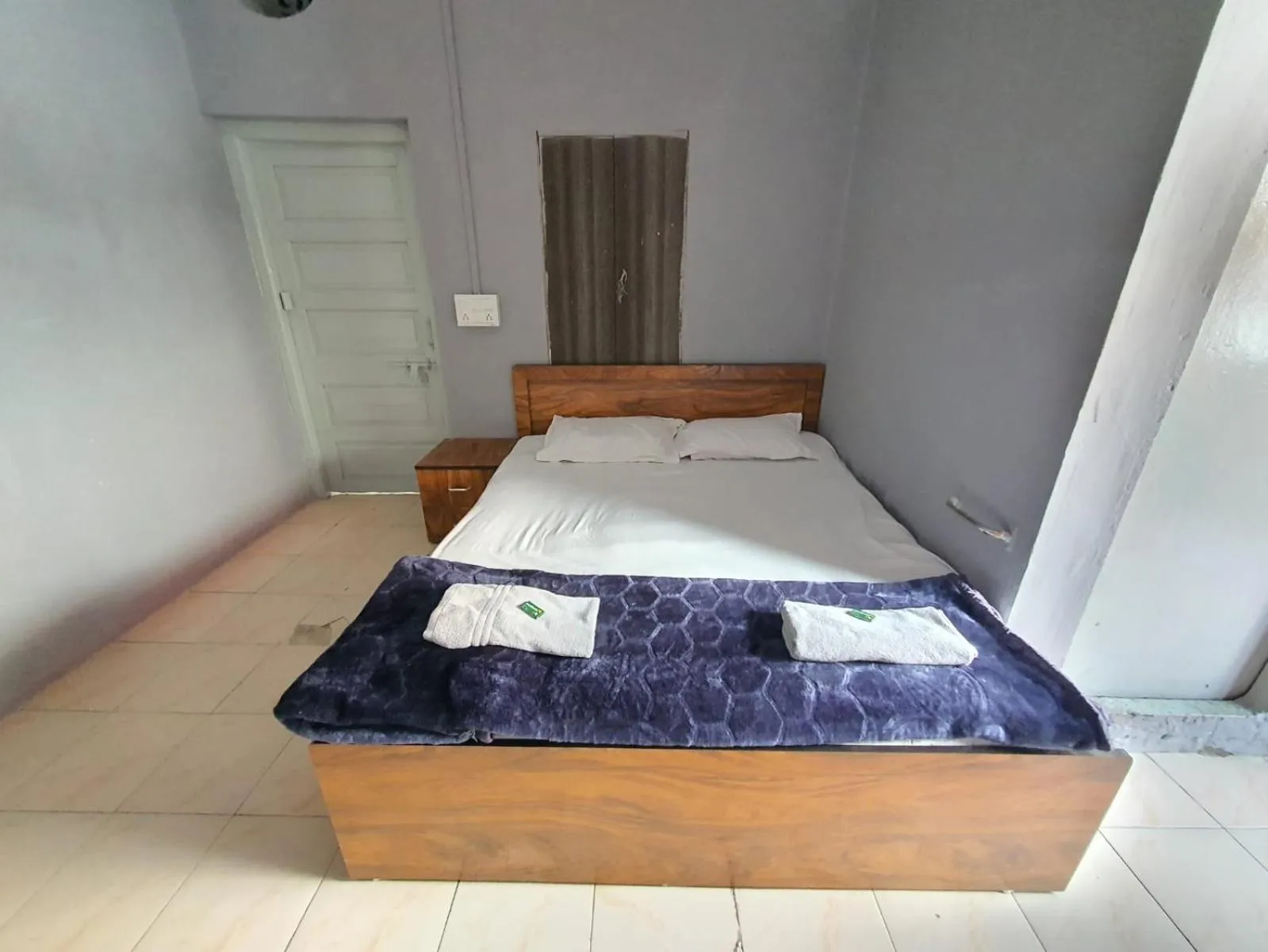 Bed in Hotel Family Stay Beside Railway Station