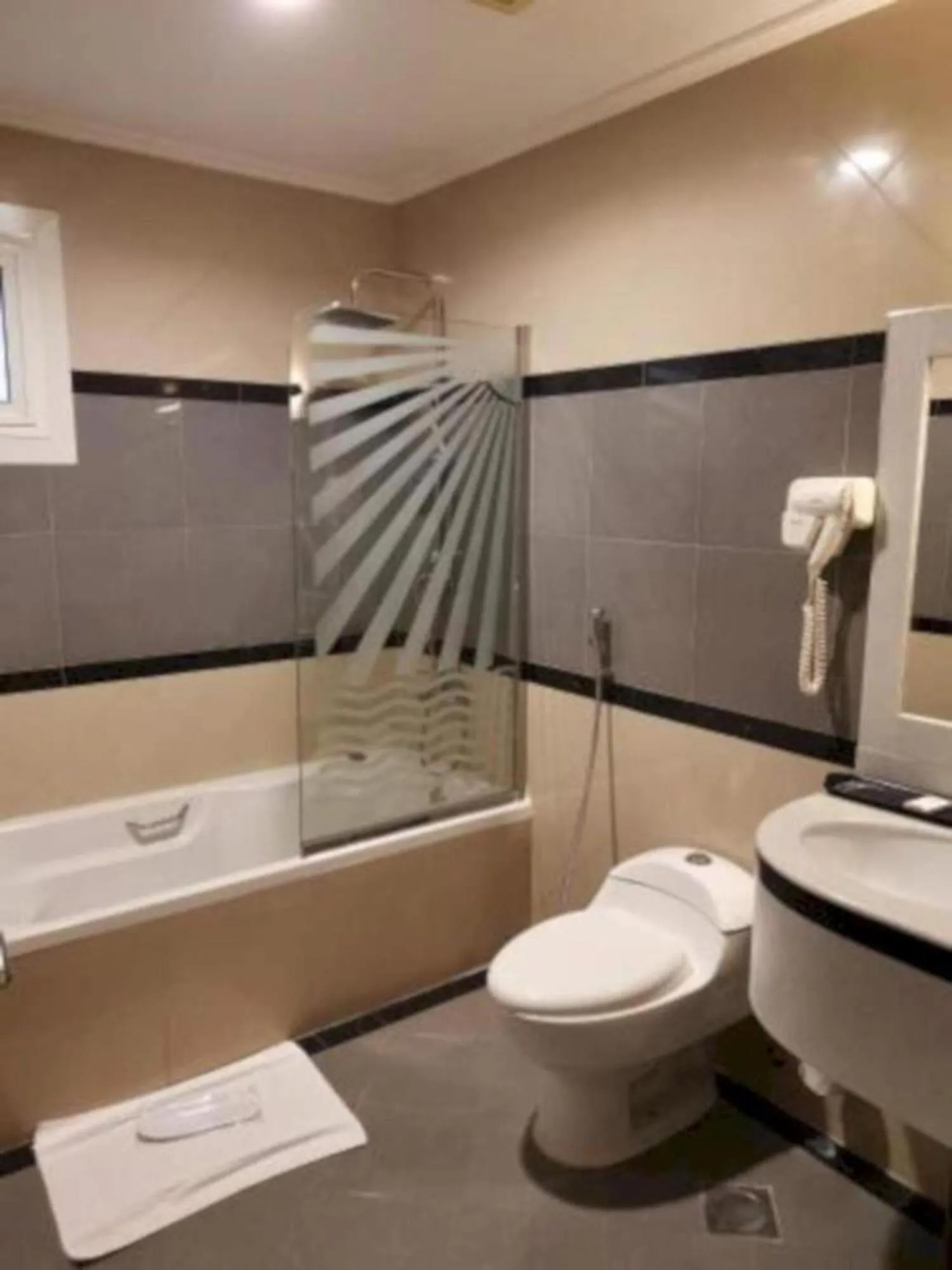 Toilet in Sunday Millennia Hotel