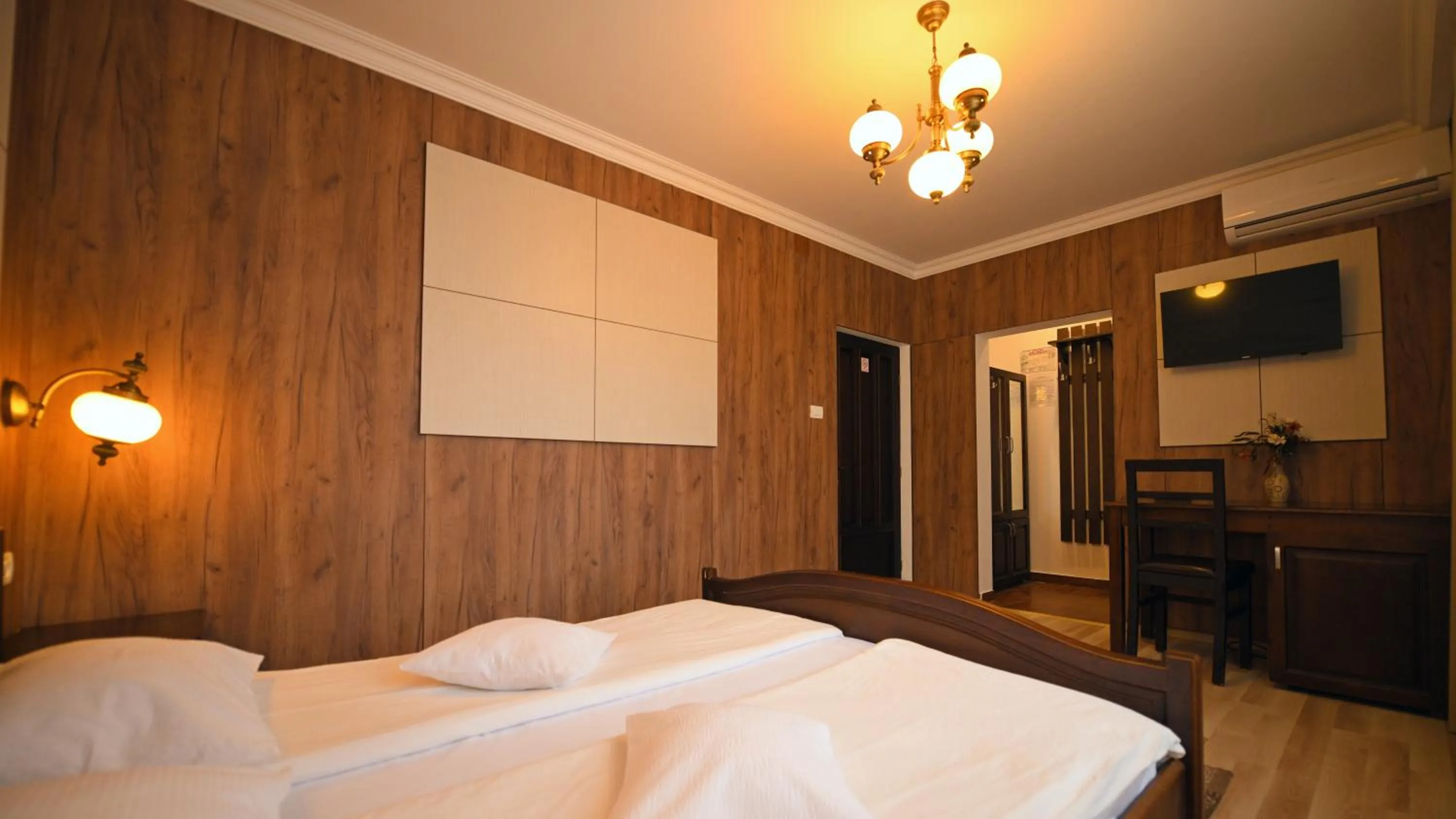 Photo of the whole room, Bed in Pensiunea Sarmis Cristal