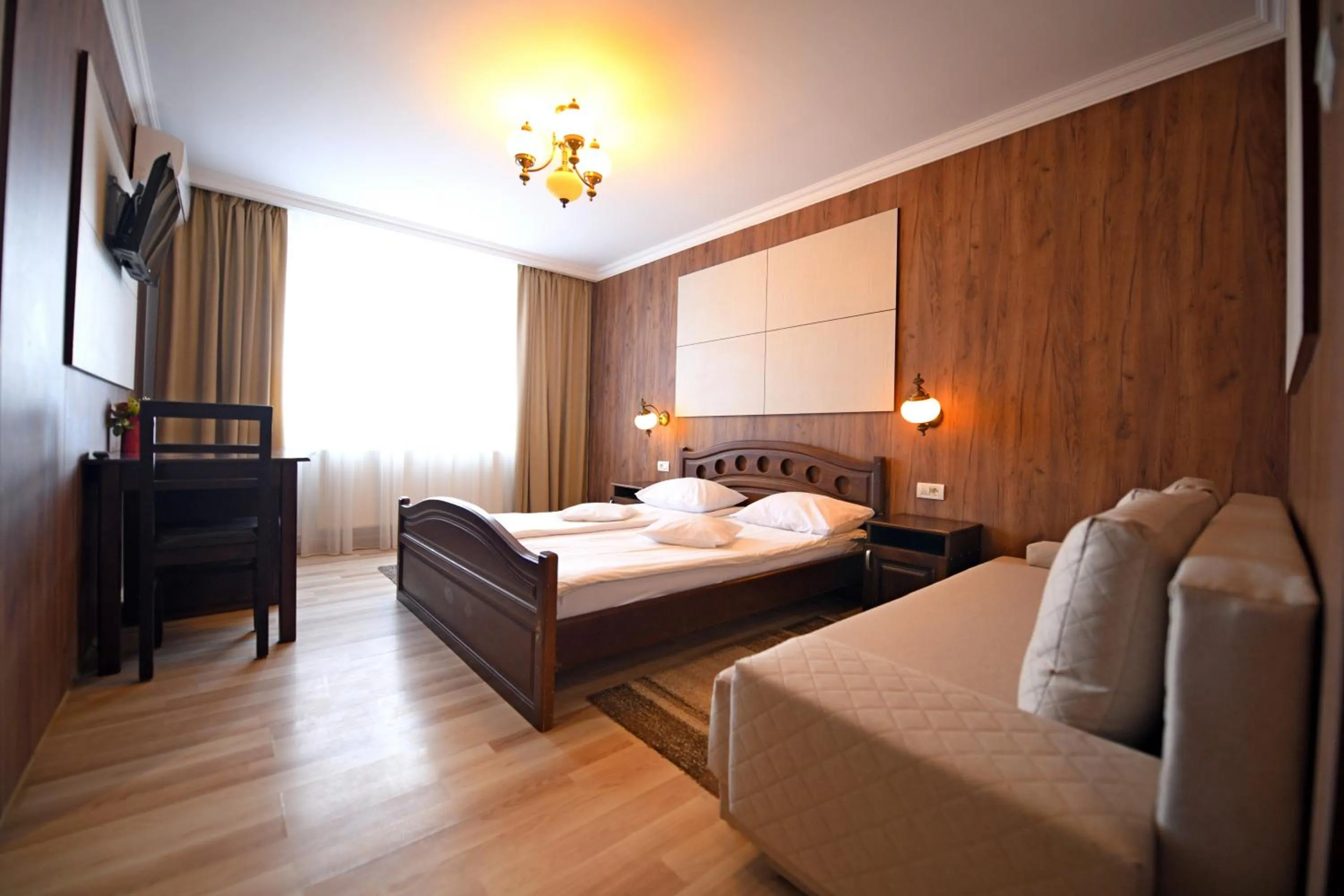 Photo of the whole room, Bed in Pensiunea Sarmis Cristal