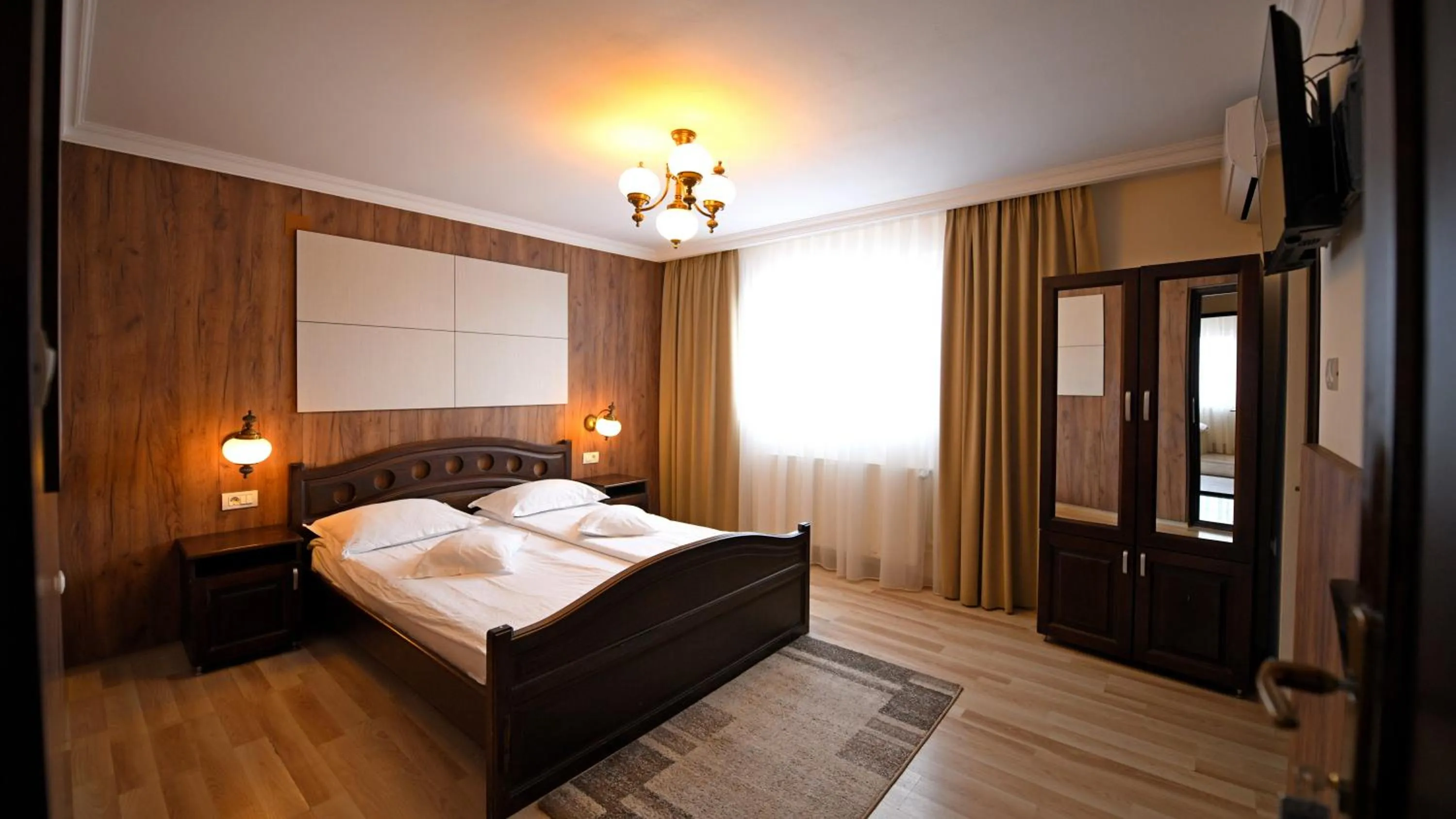 Photo of the whole room, Bed in Pensiunea Sarmis Cristal