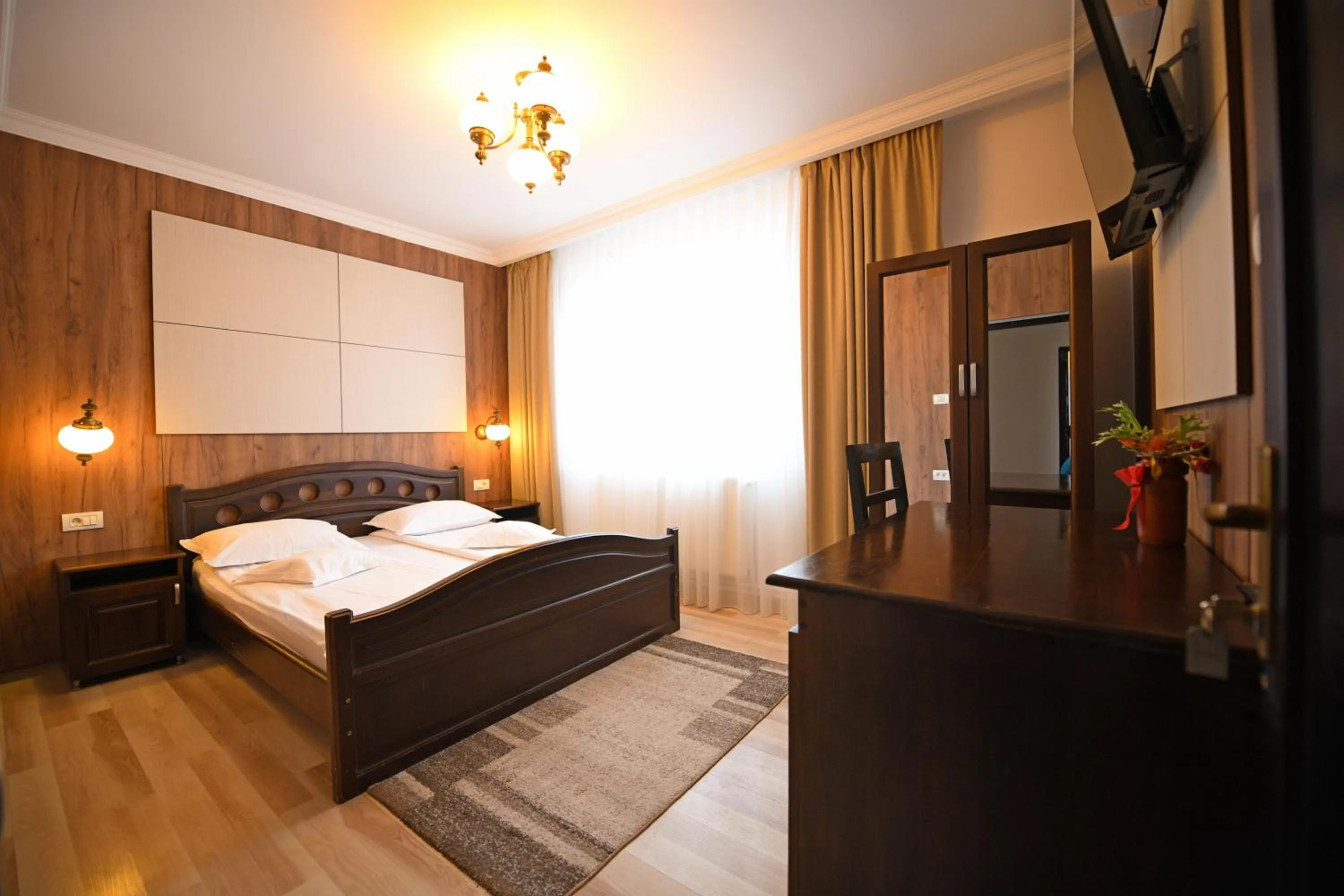 Photo of the whole room, Bed in Pensiunea Sarmis Cristal