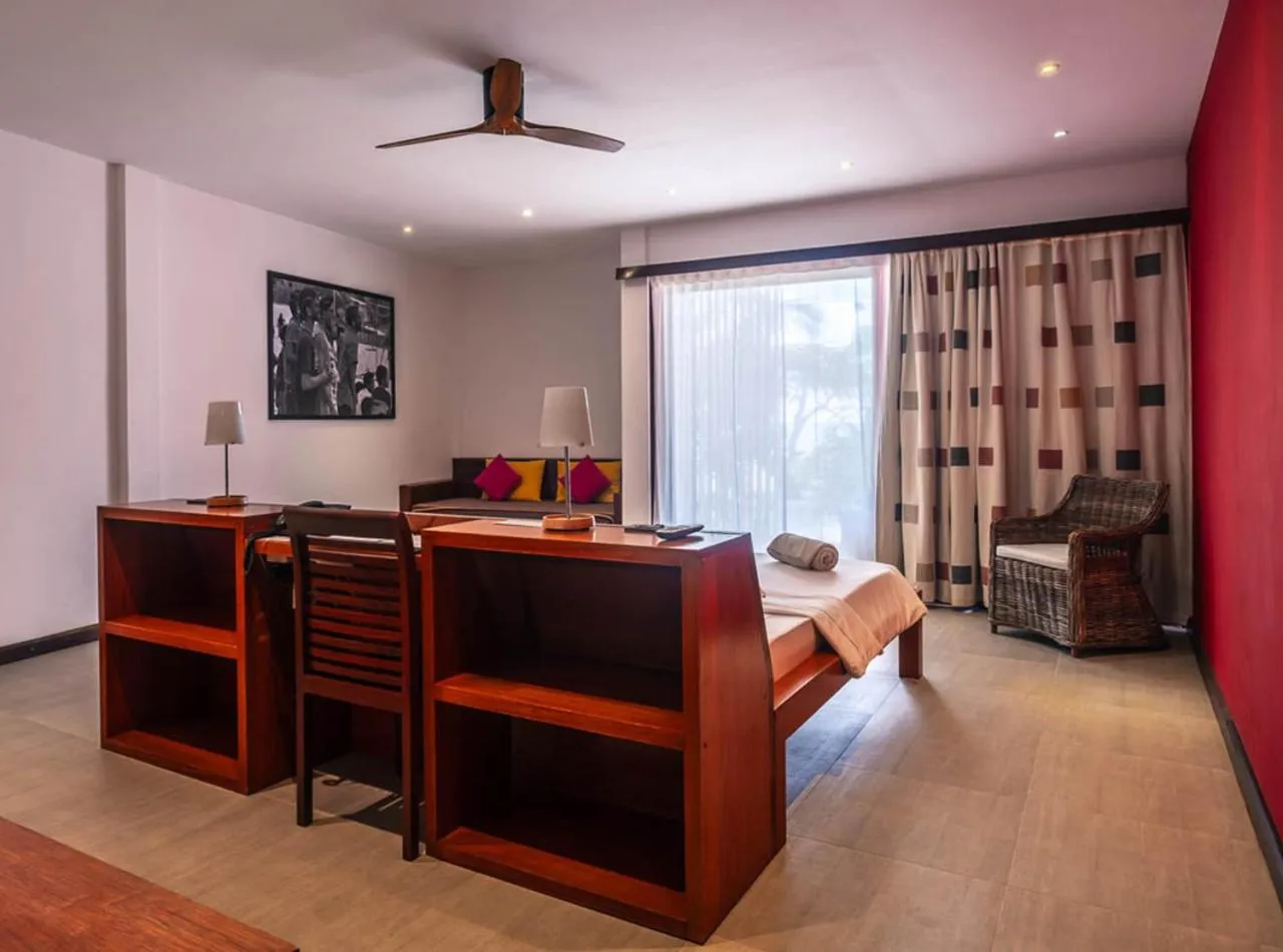 Bedroom in The Barefoot Eco Hotel