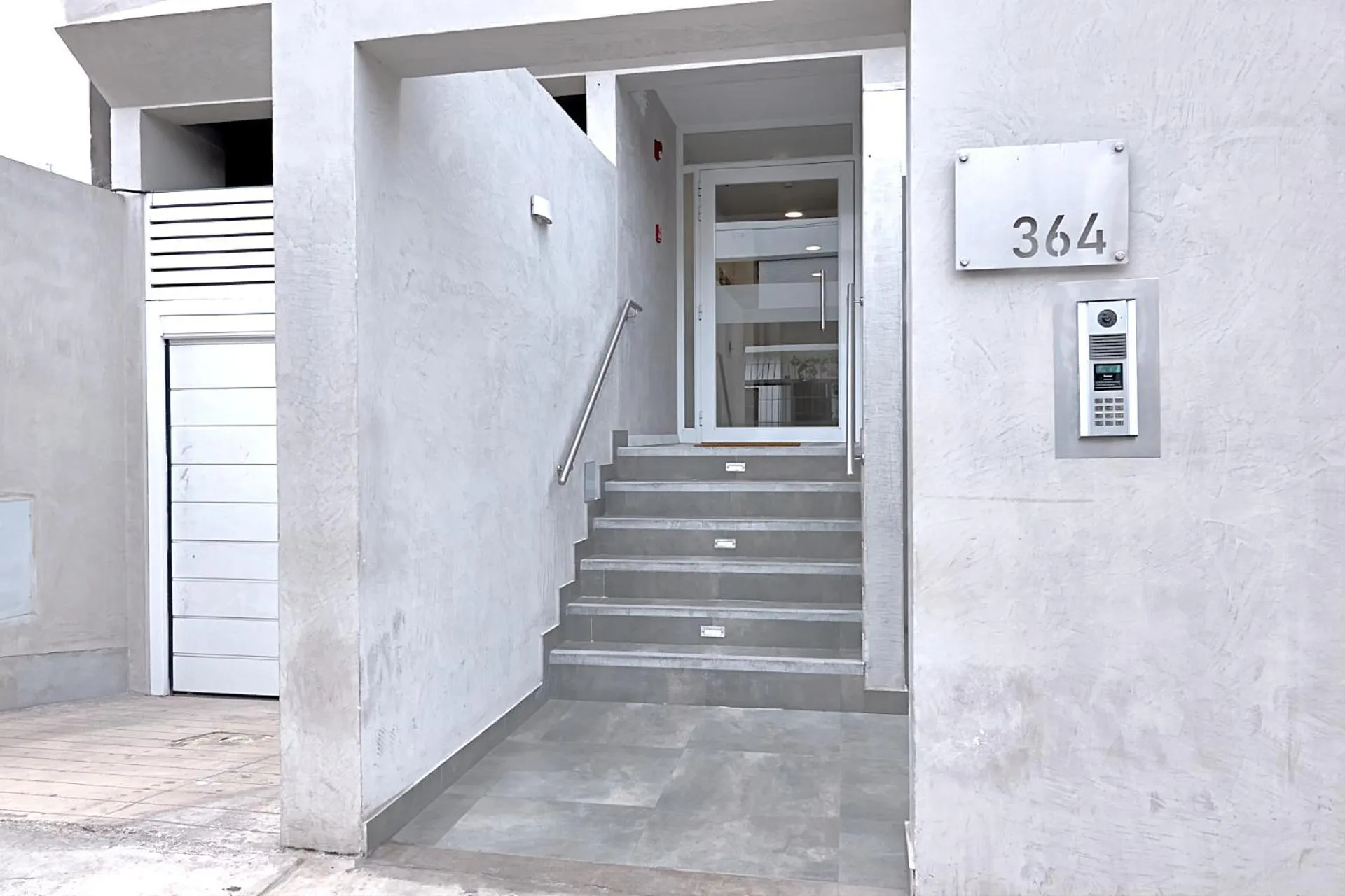 Facade/entrance in Quark Apartments