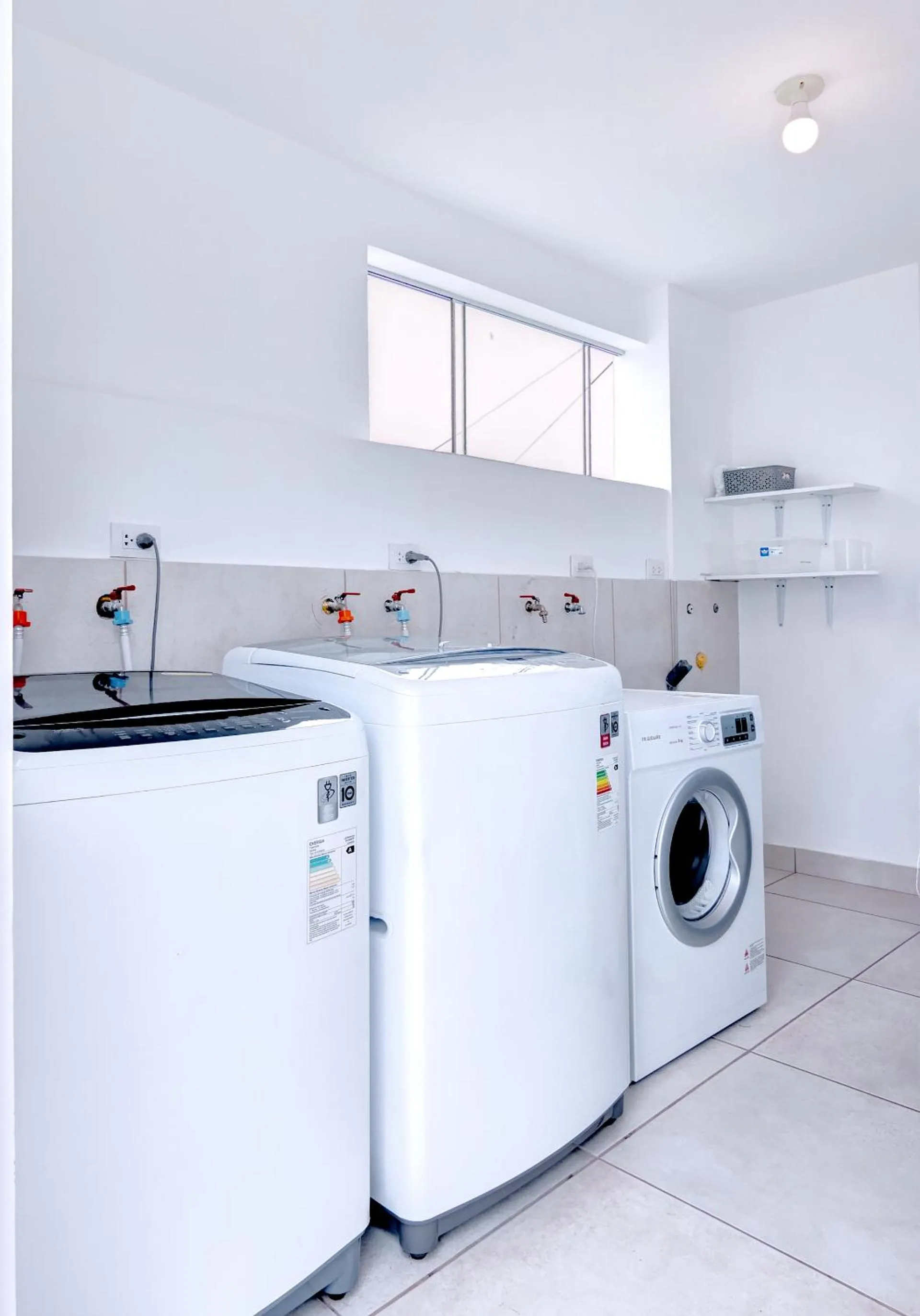 laundry in Quark Apartments