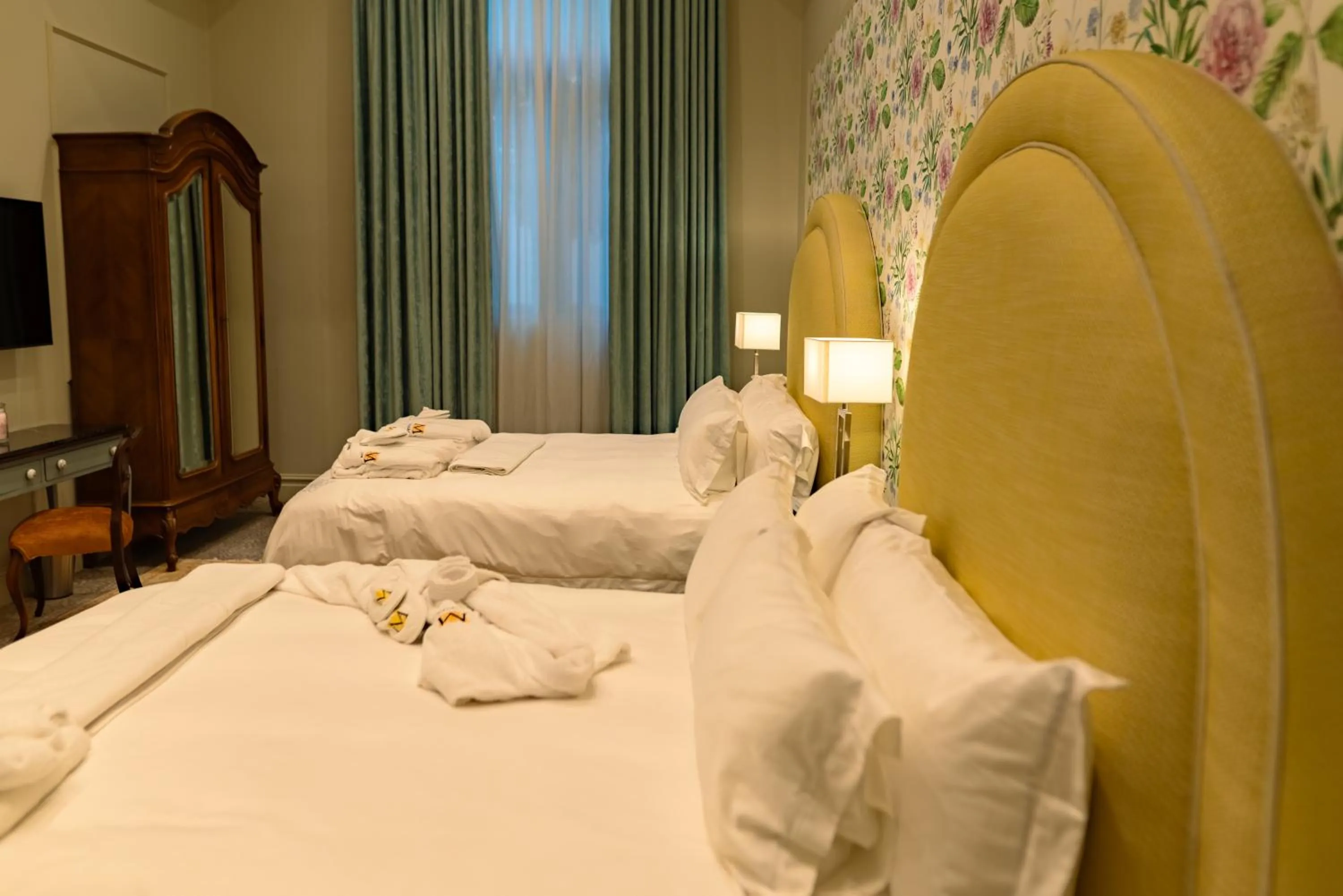 Bed in The Monarch Hotel