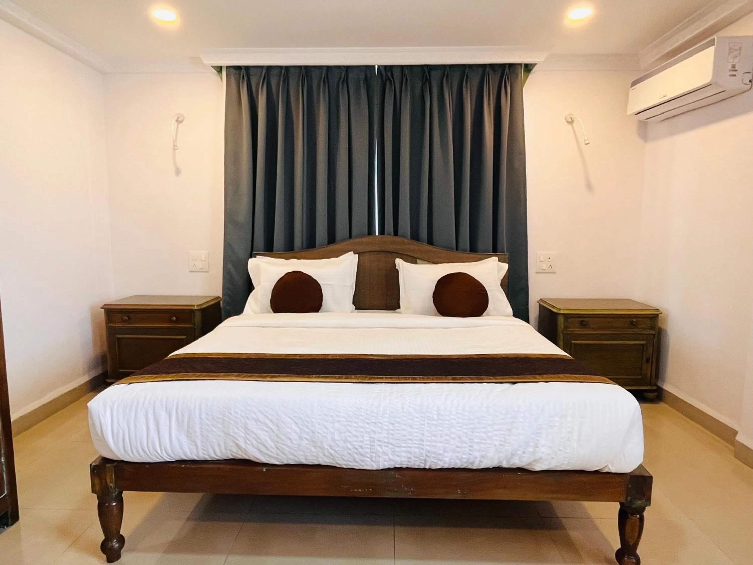 Bed in Nagas Hotel Satyavati Morjim