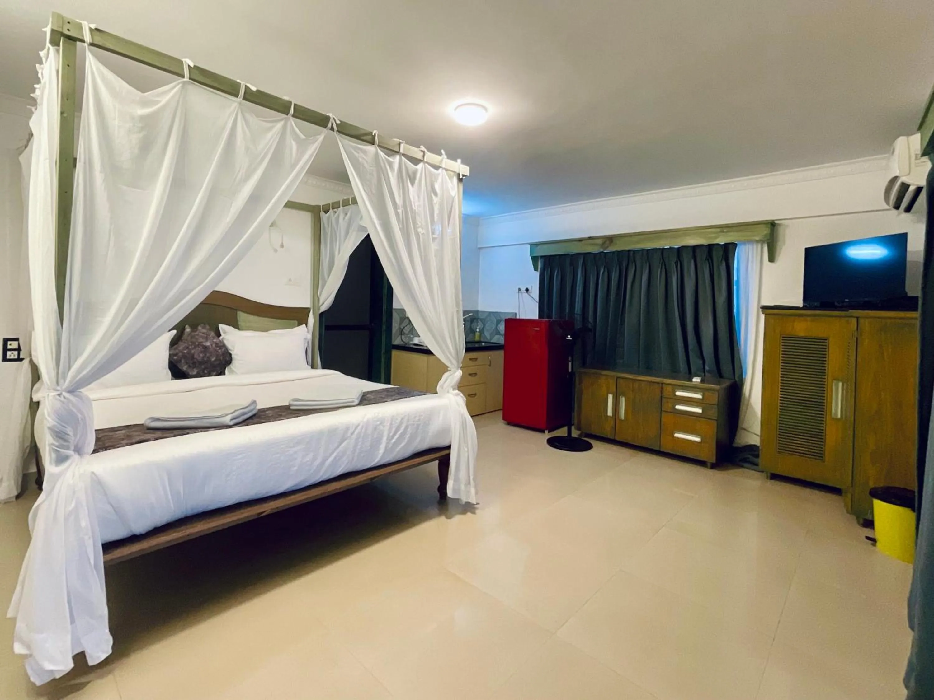 Photo of the whole room, Bed in Nagas Hotel Satyavati Morjim