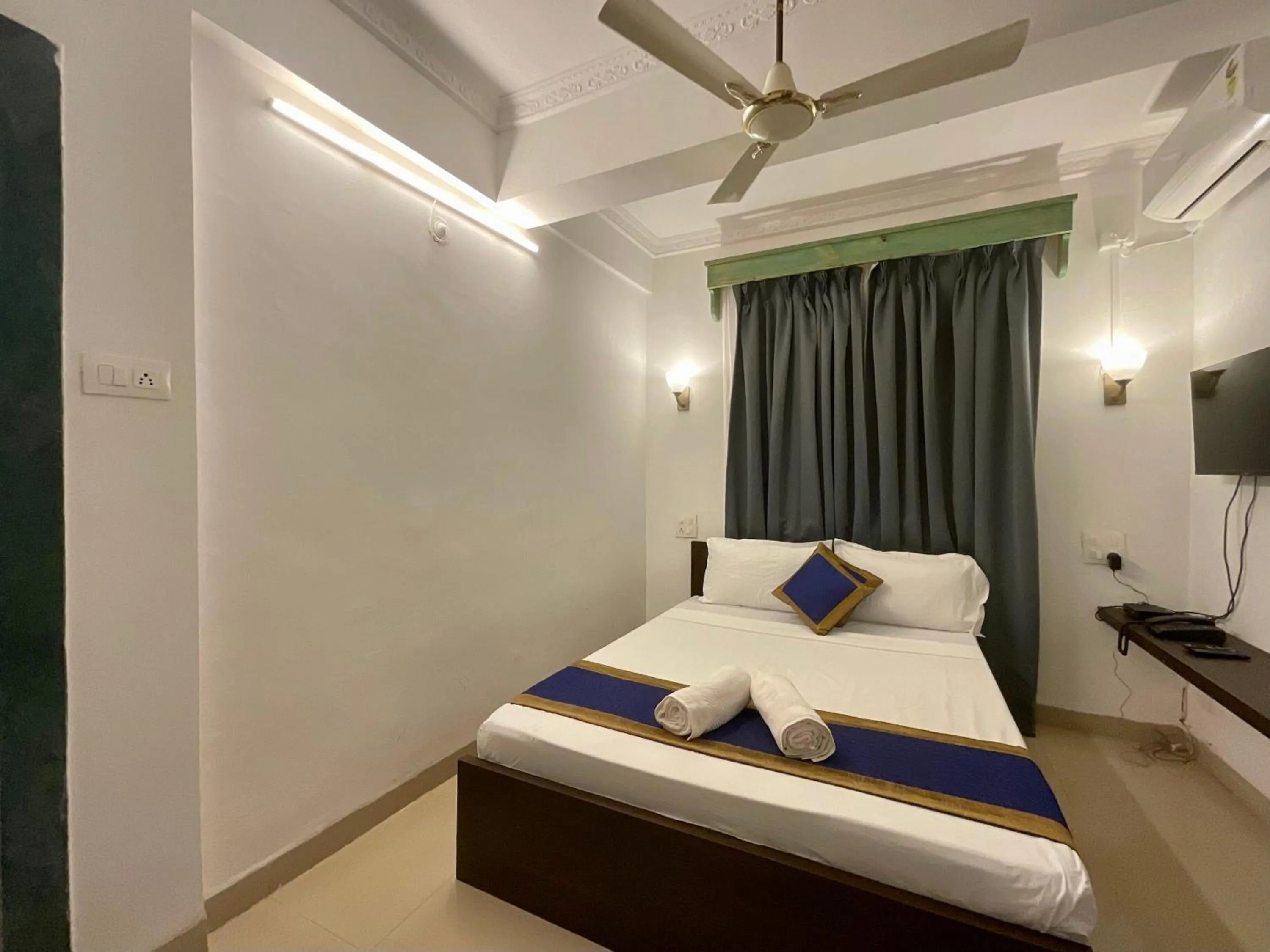 Photo of the whole room, Bed in Nagas Hotel Satyavati Morjim