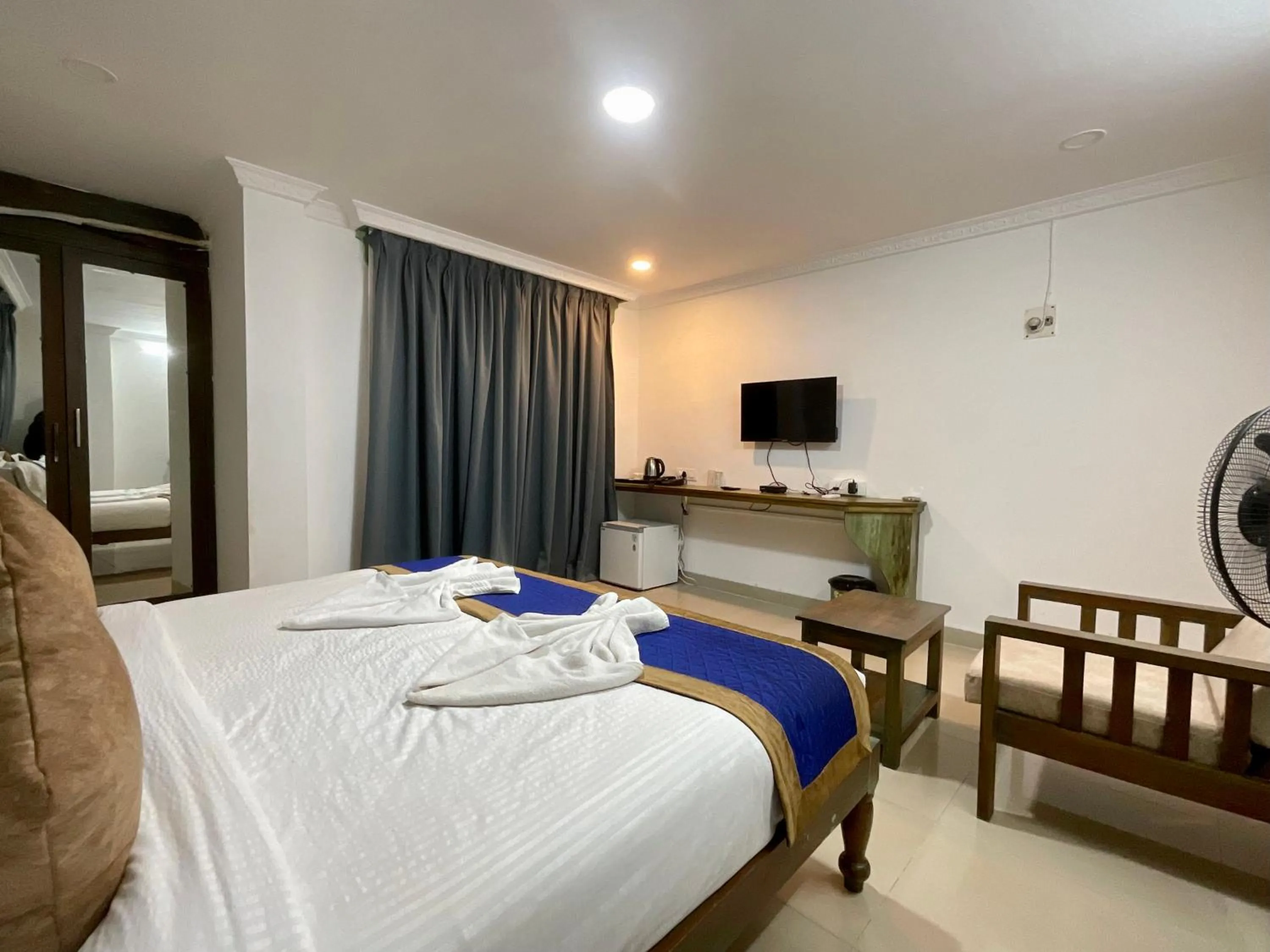 Bed in Nagas Hotel Satyavati Morjim