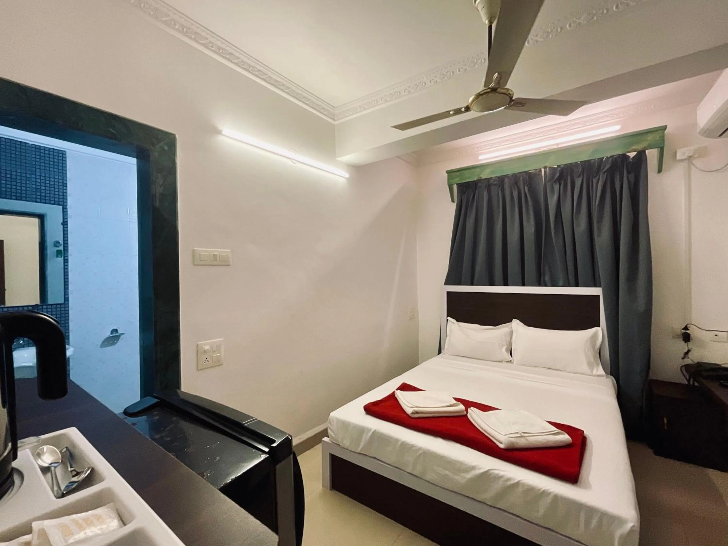 Photo of the whole room, Bed in Nagas Hotel Satyavati Morjim