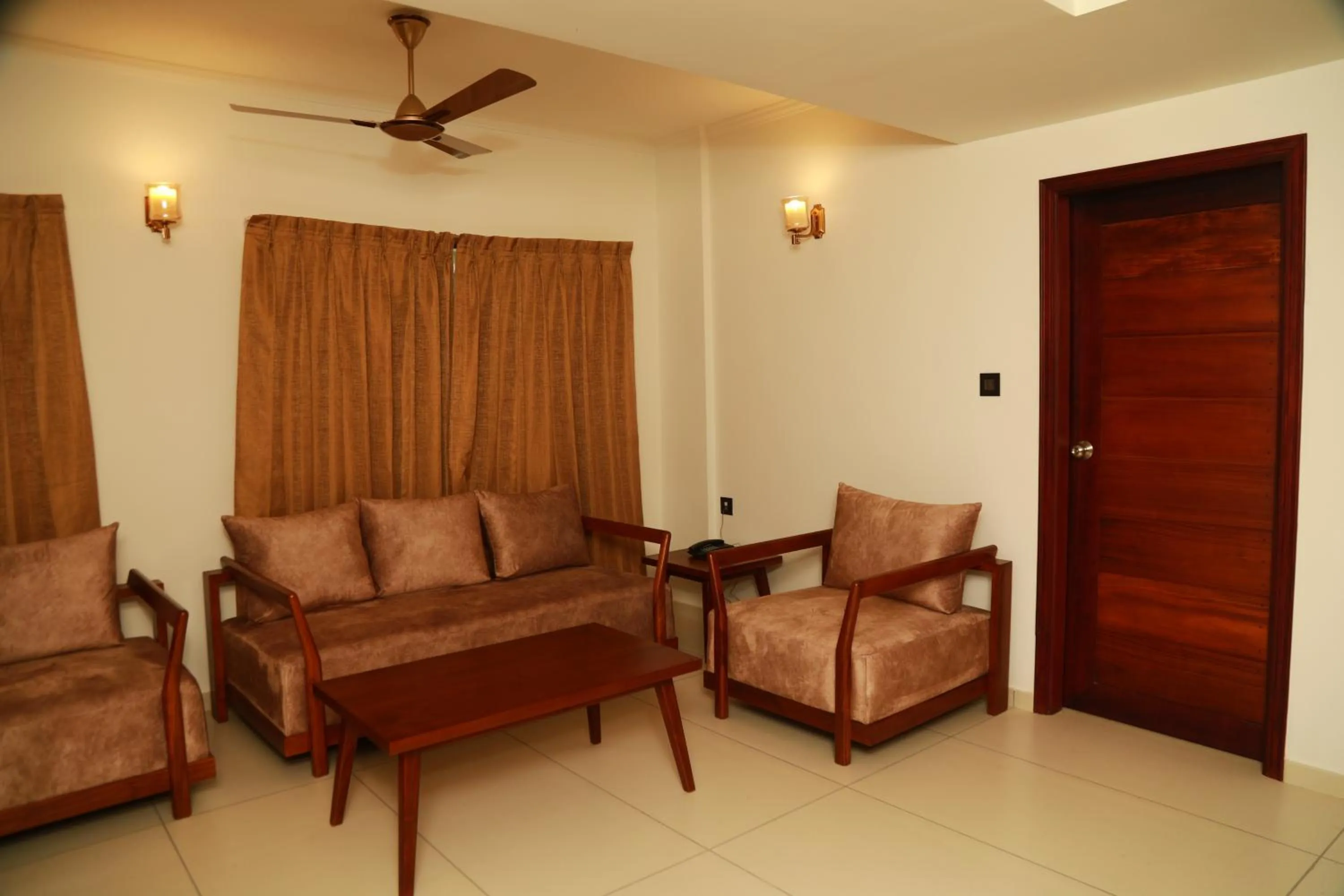 Living room in Lagoona Beach Resort, Kovalam