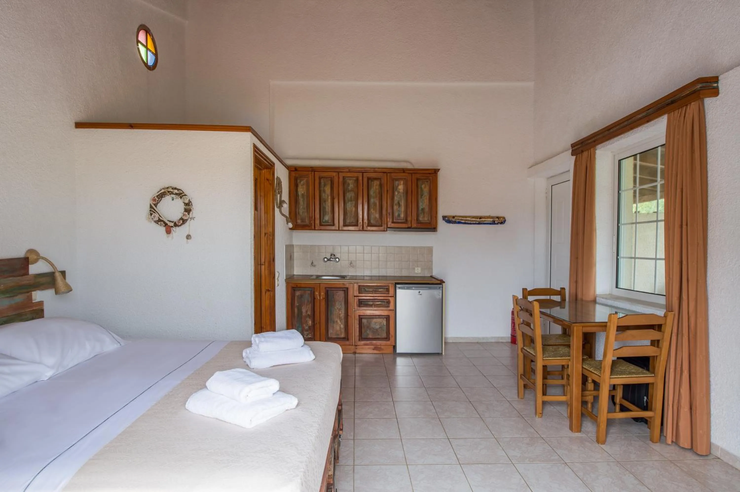 Photo of the whole room, Bed in Koroni Village