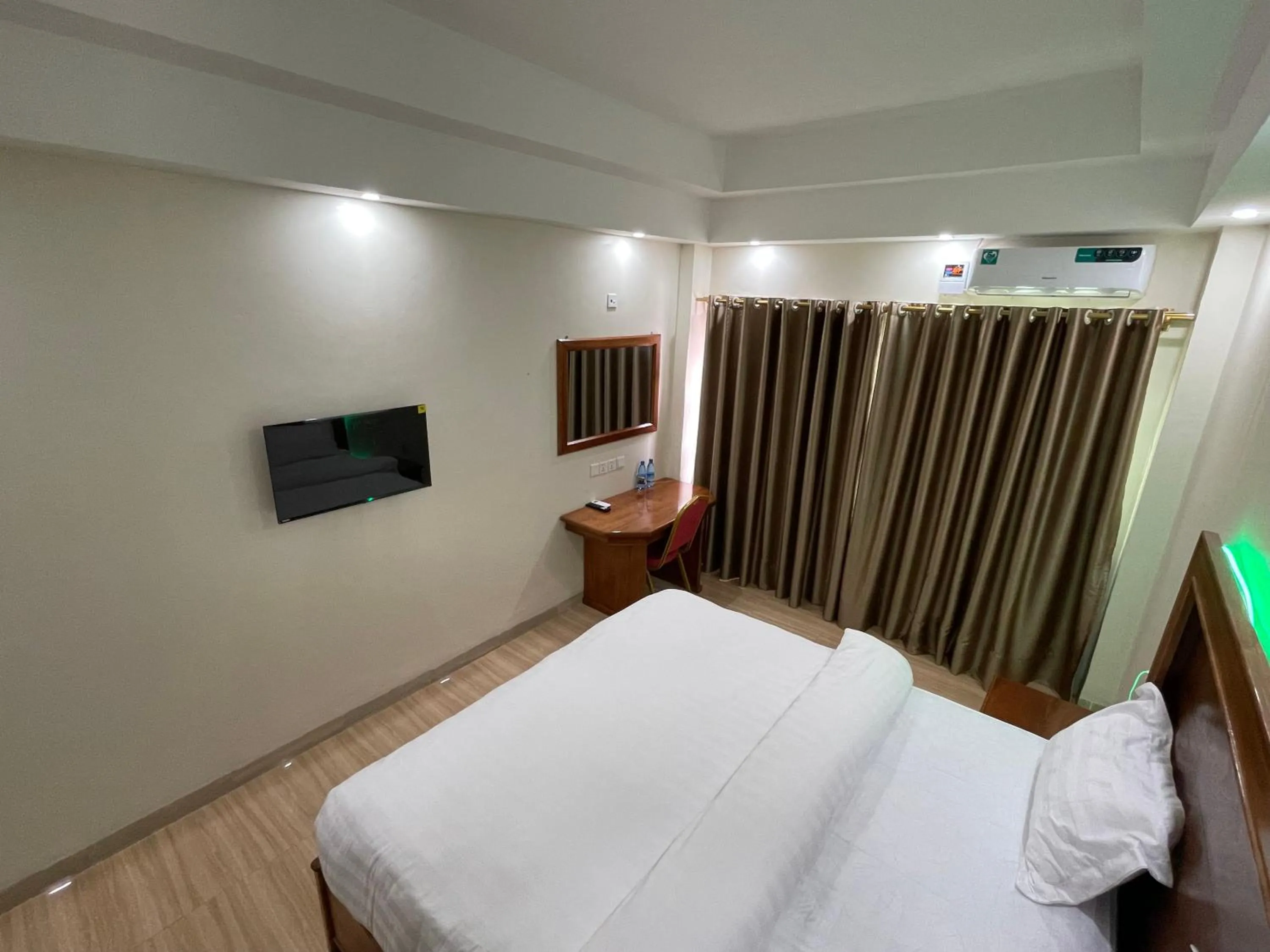 Bed in Pulickal Heights Hotel