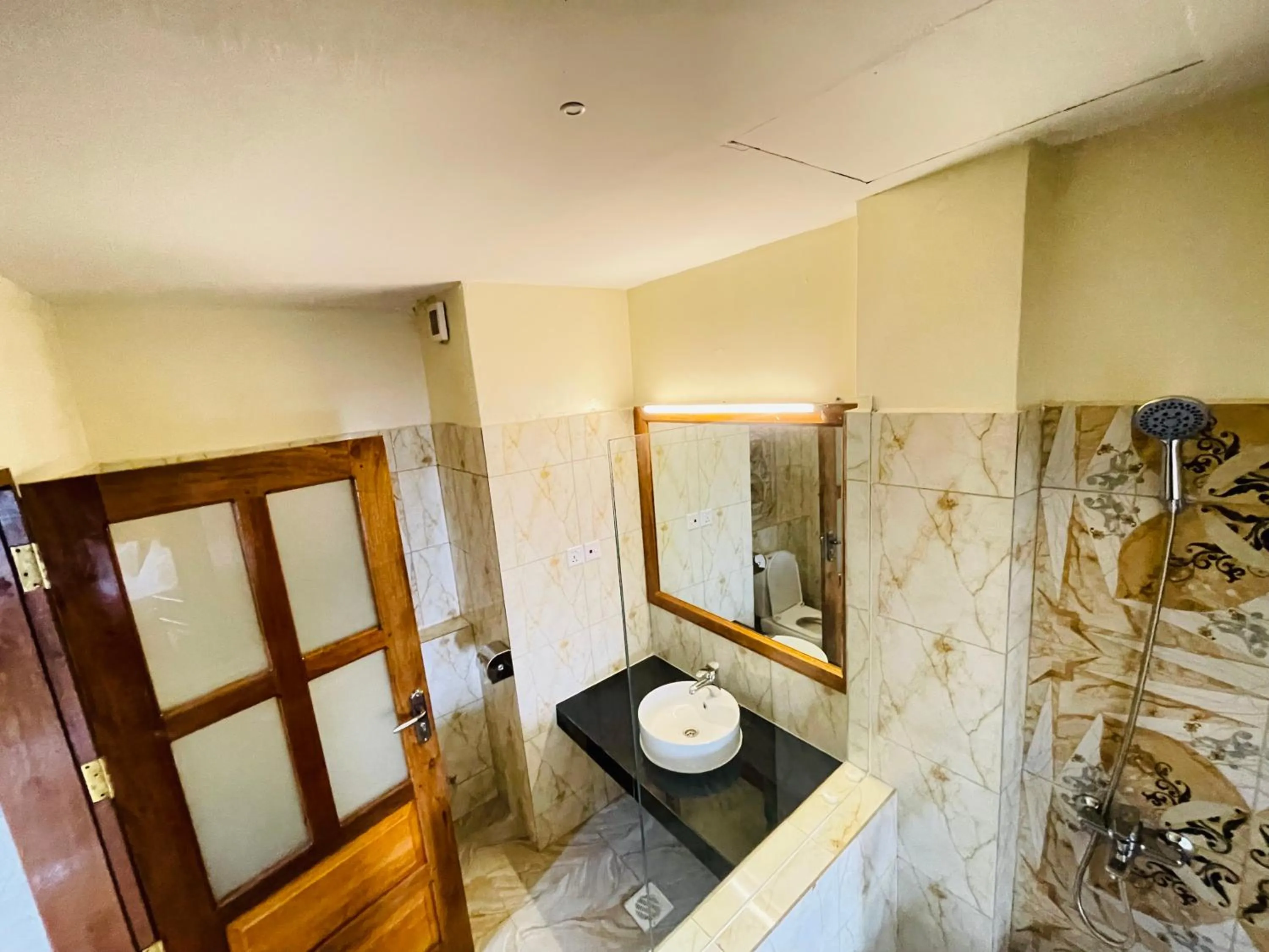 Shower in Pulickal Heights Hotel