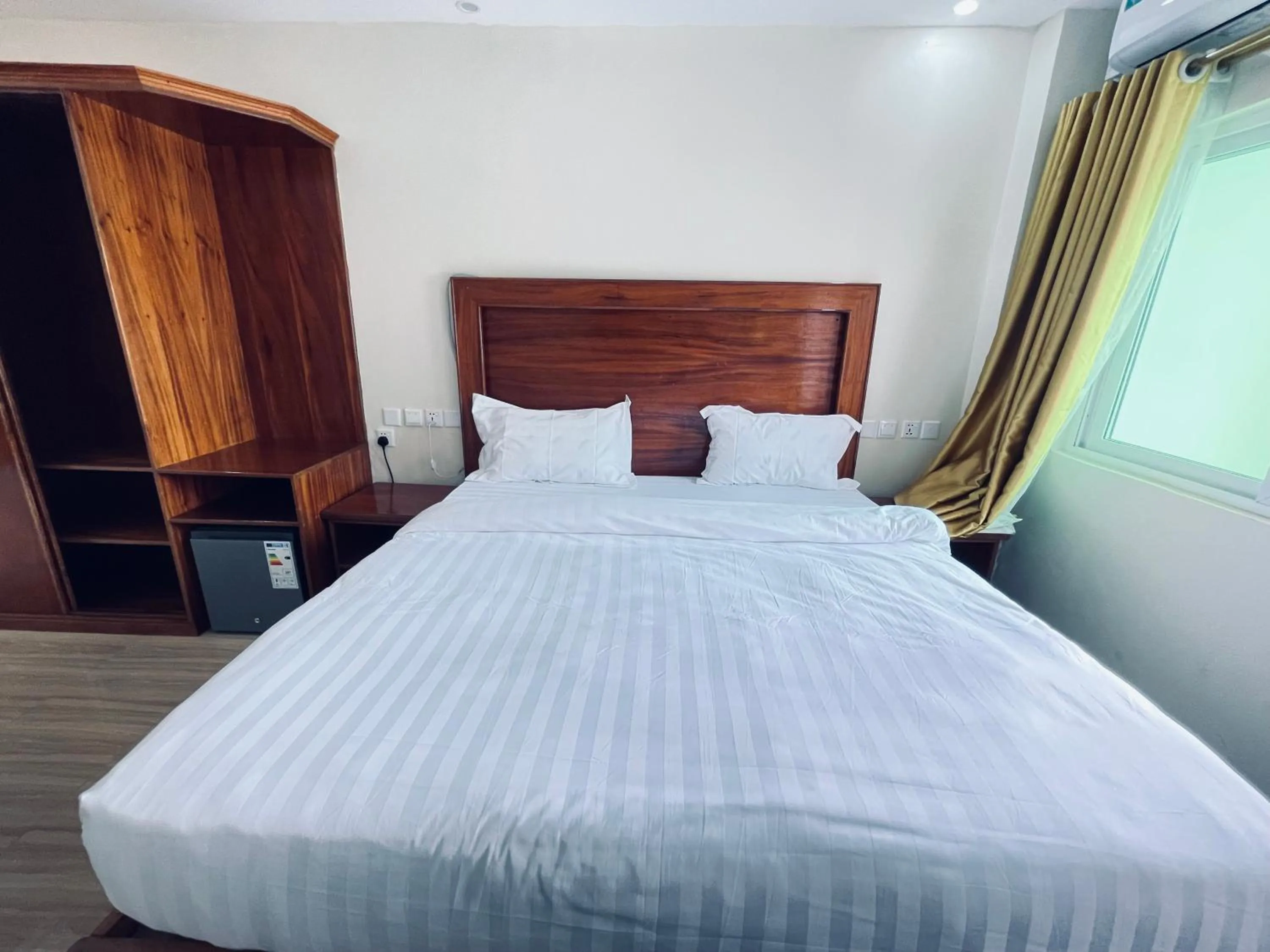 Bed in Pulickal Heights Hotel