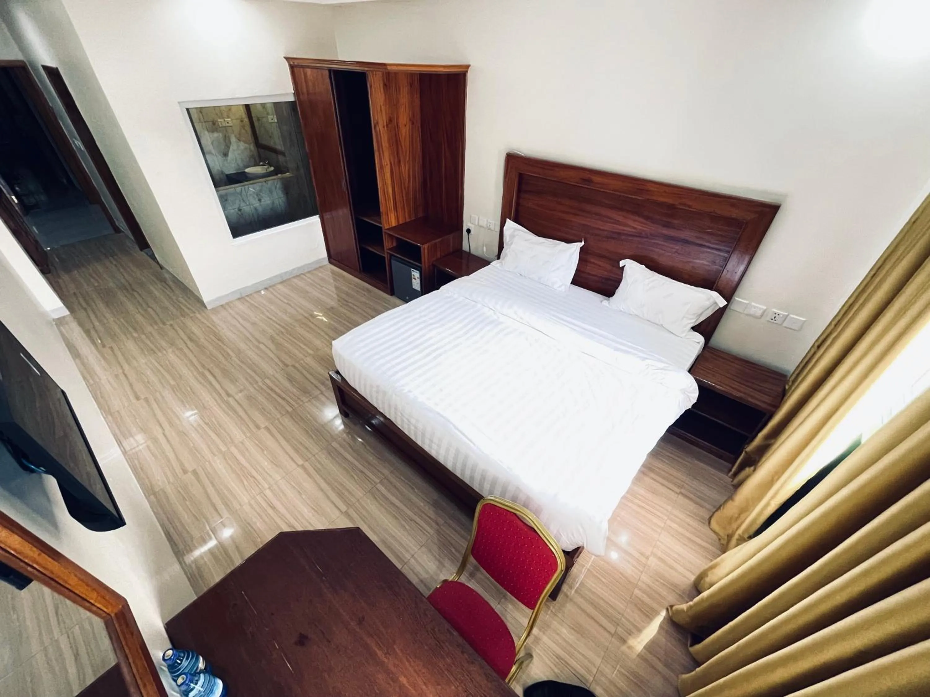 Bed in Pulickal Heights Hotel