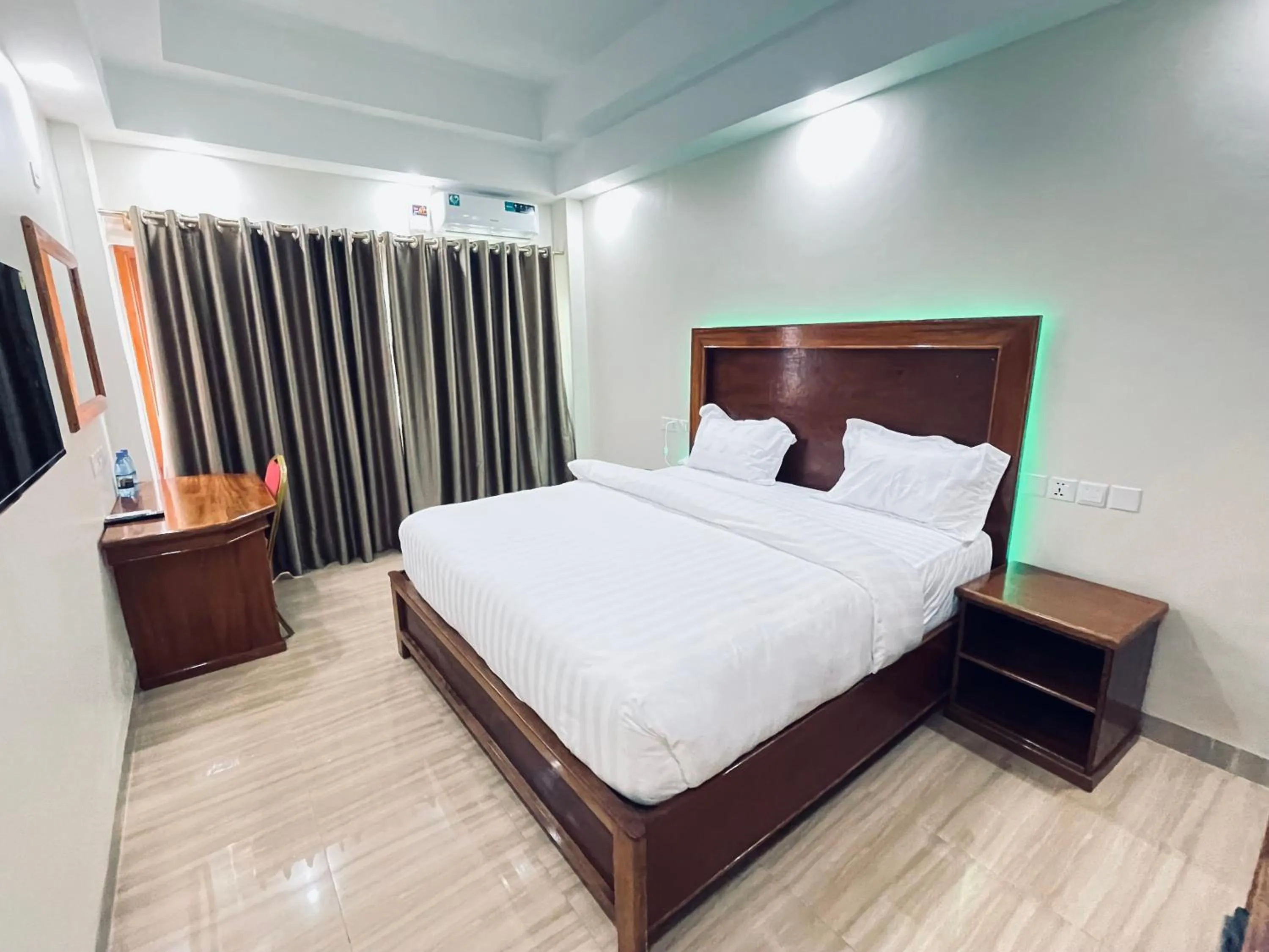 Bed in Pulickal Heights Hotel