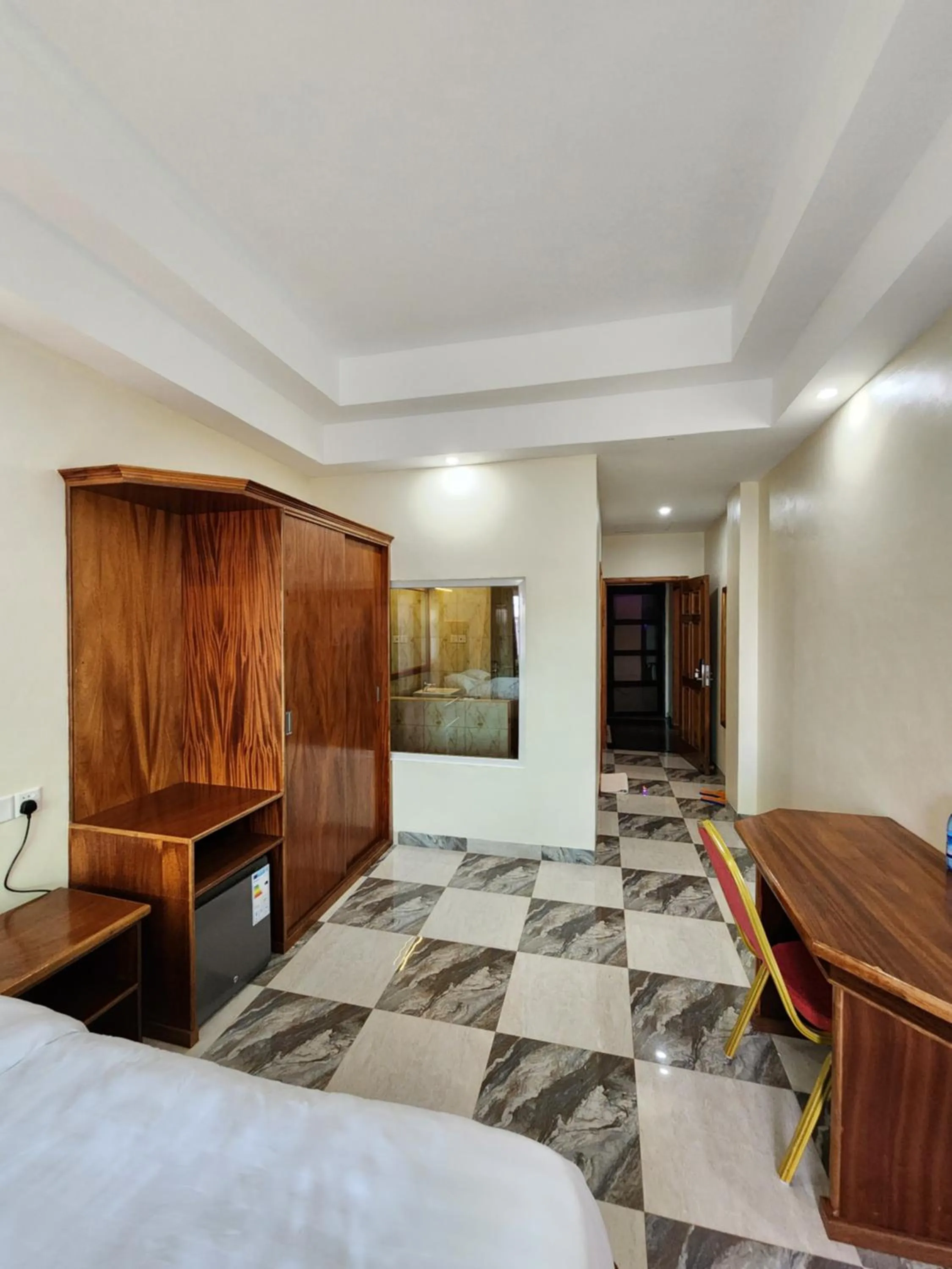 Bedroom in Pulickal Heights Hotel