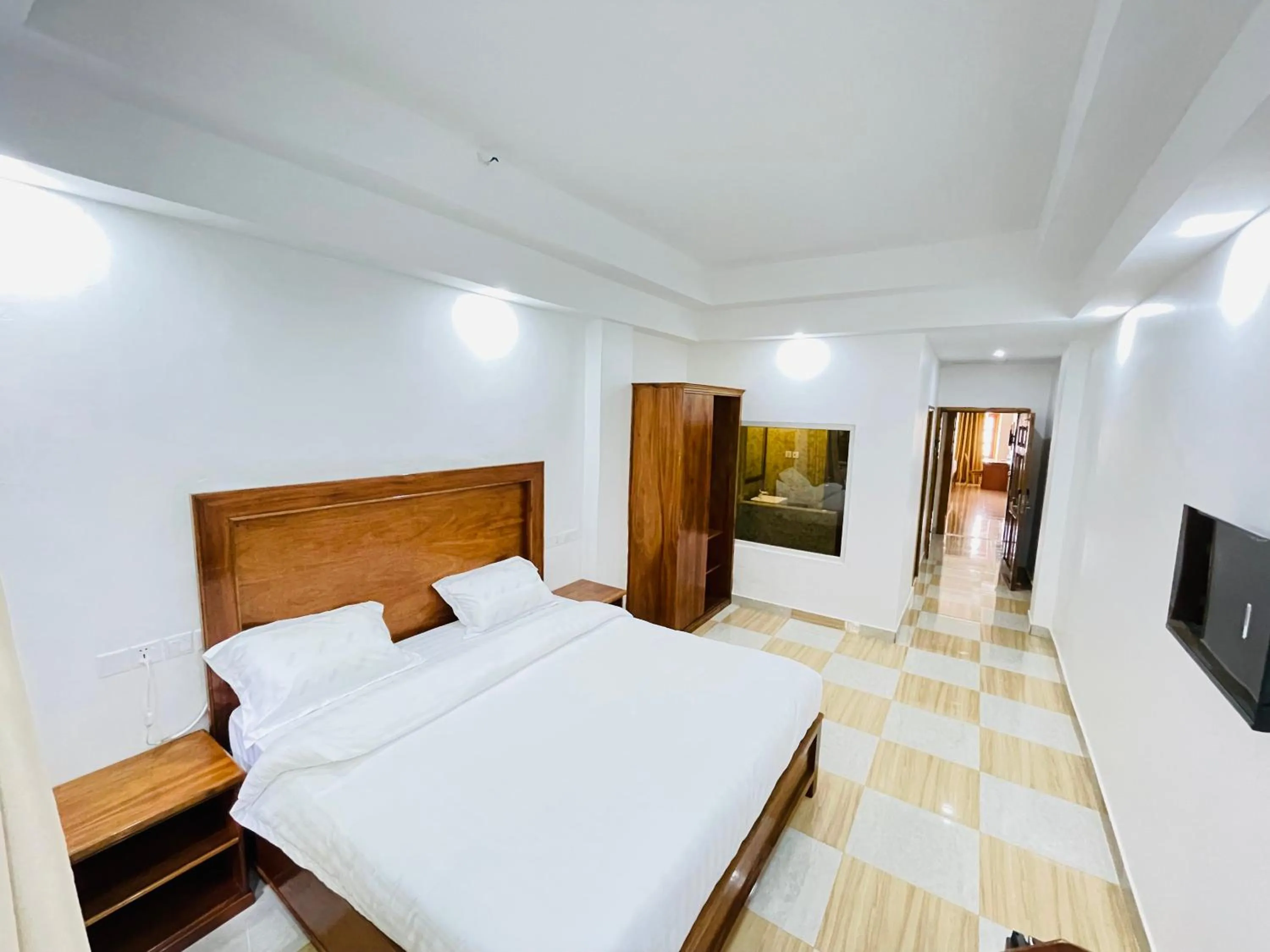 Bed in Pulickal Heights Hotel