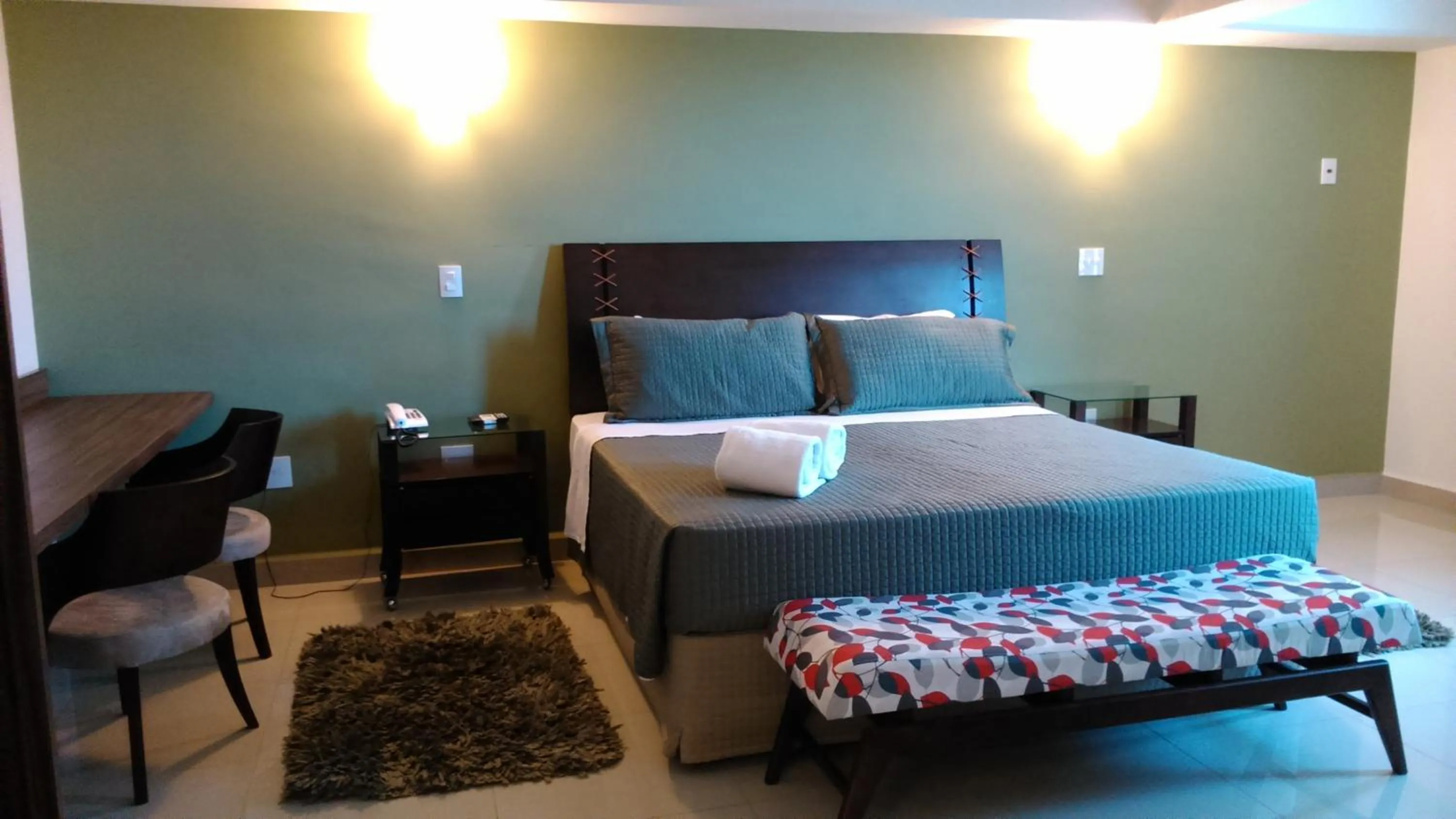 Photo of the whole room, Bed in Ipe Center Hotel