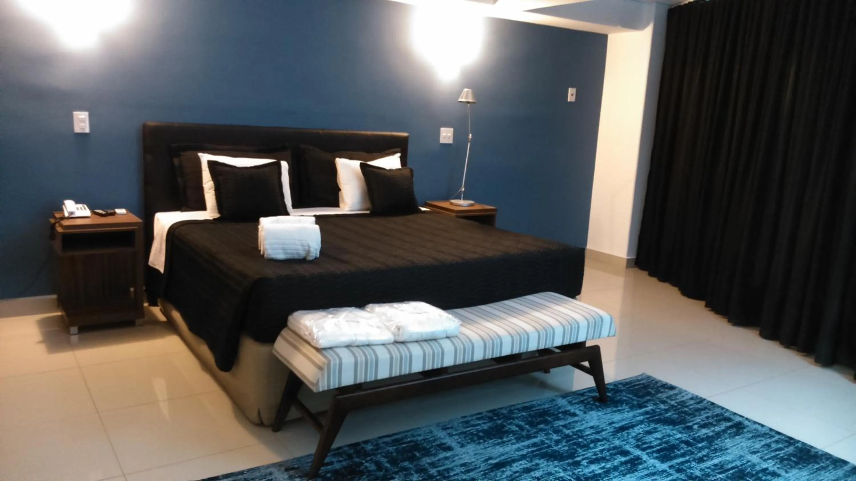 Bed in Ipe Center Hotel