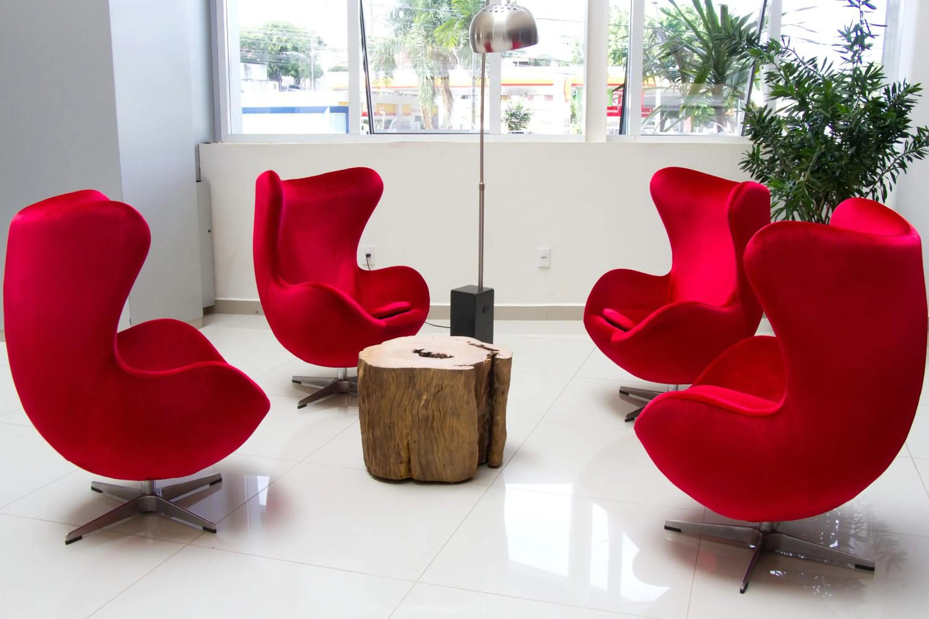 Communal lounge/ TV room in Ipe Center Hotel