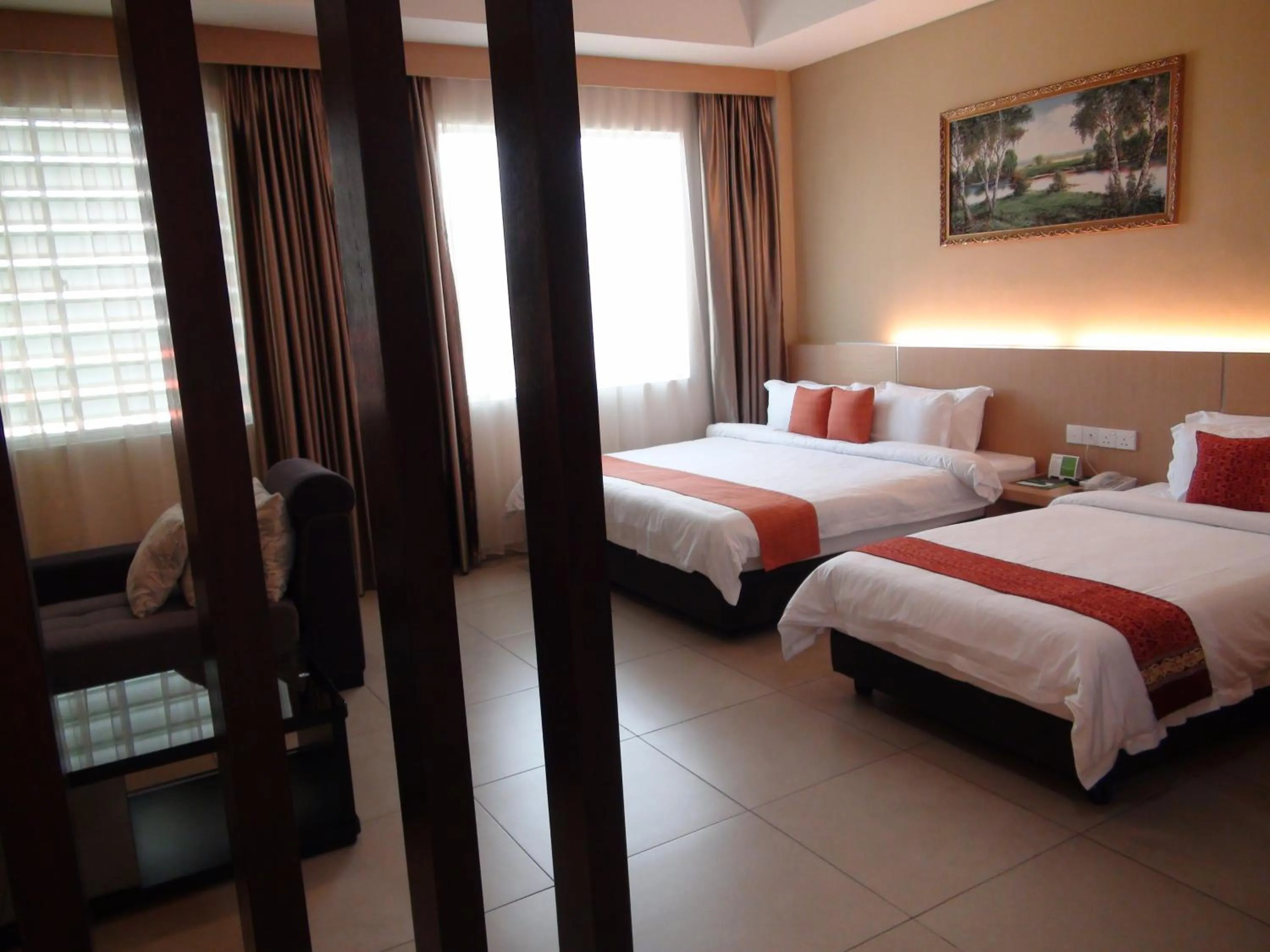 Bed in Paragon Lutong Hotel