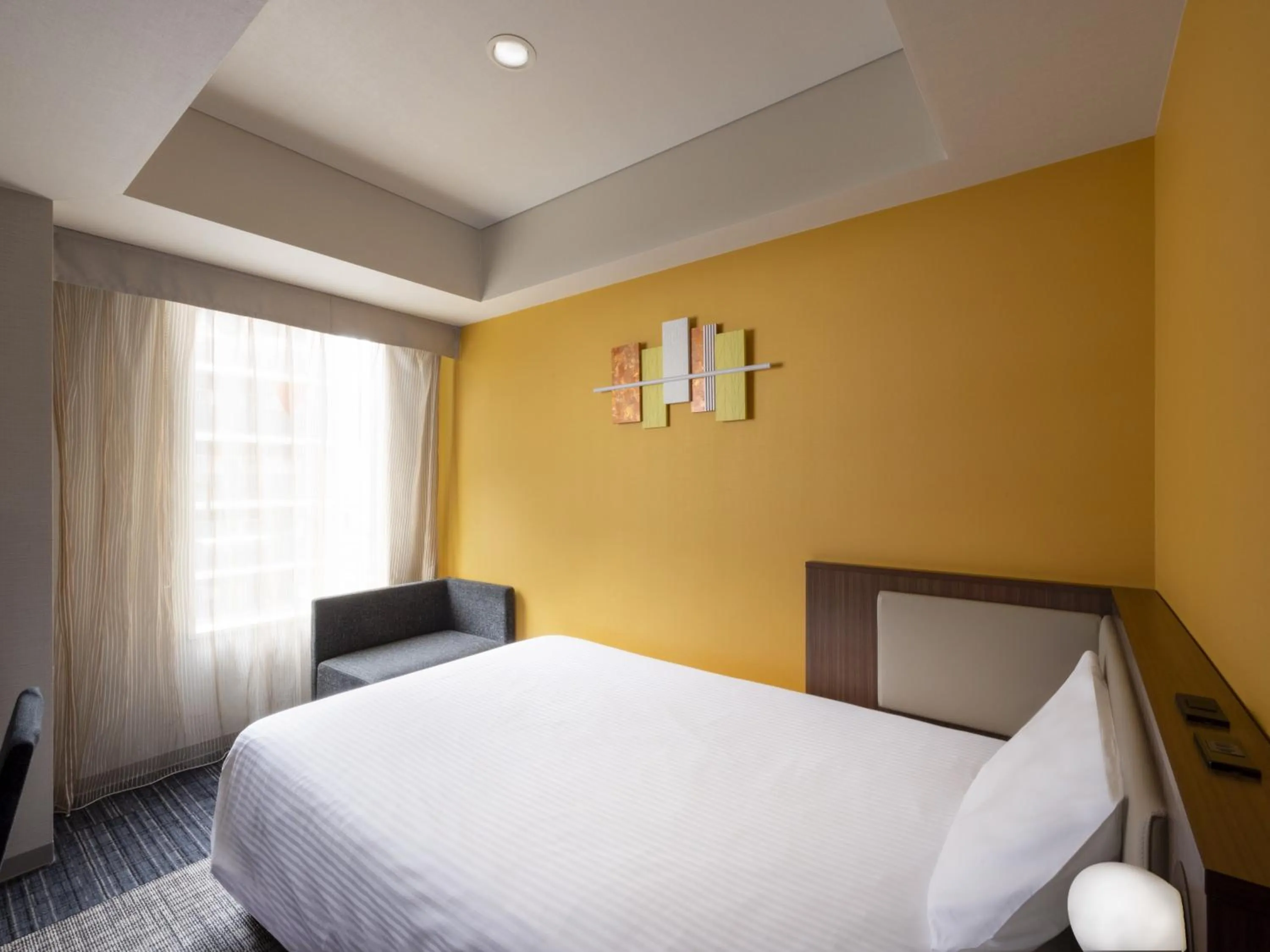 Bed in ibis Styles Kyoto Shijo