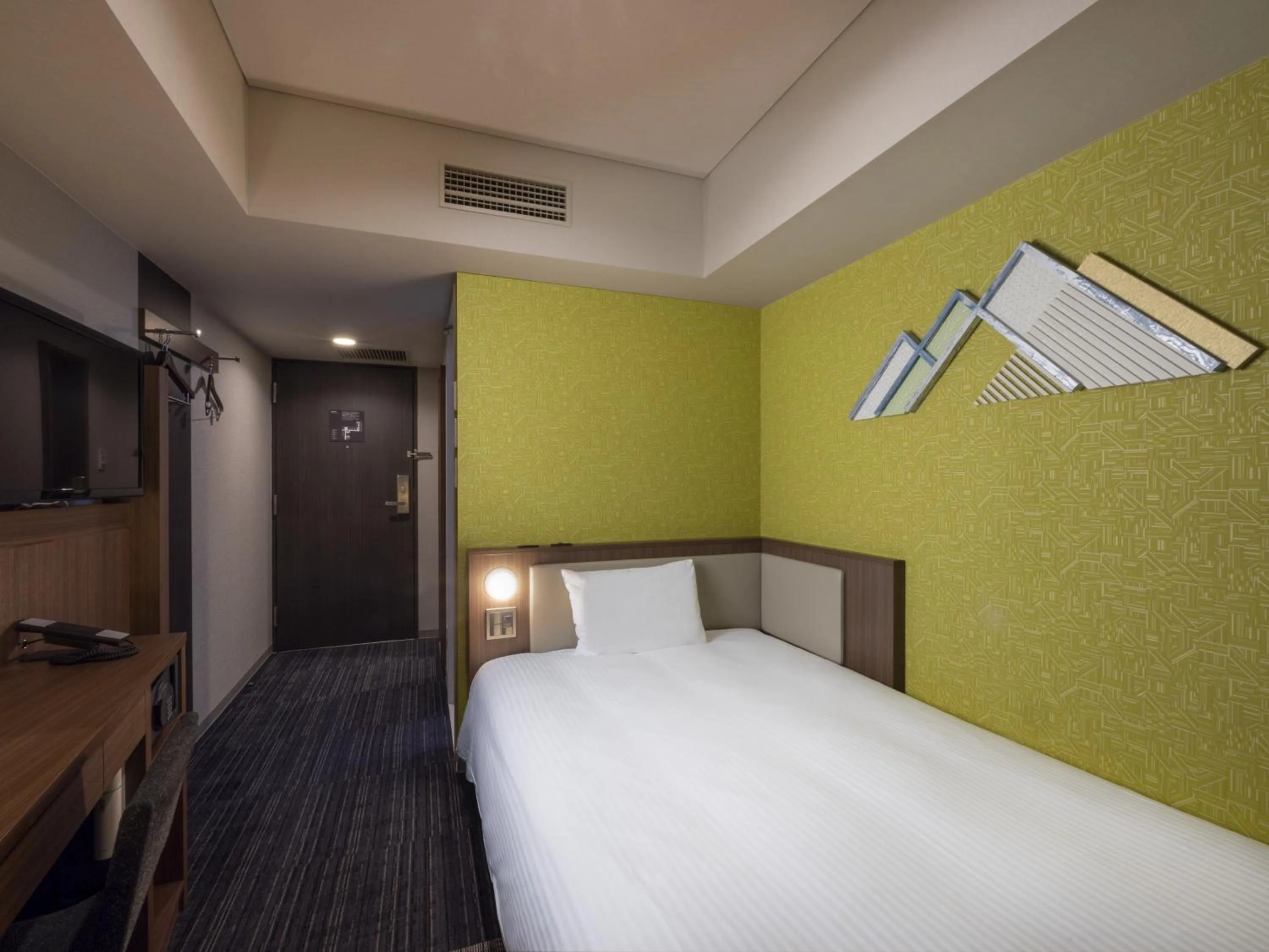 Bed in ibis Styles Kyoto Shijo