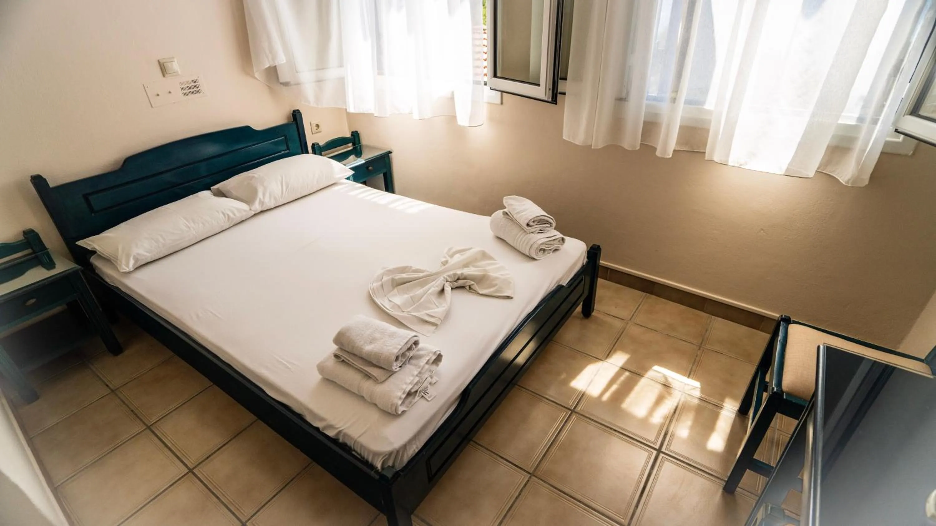 Bed in Ionio Hotel