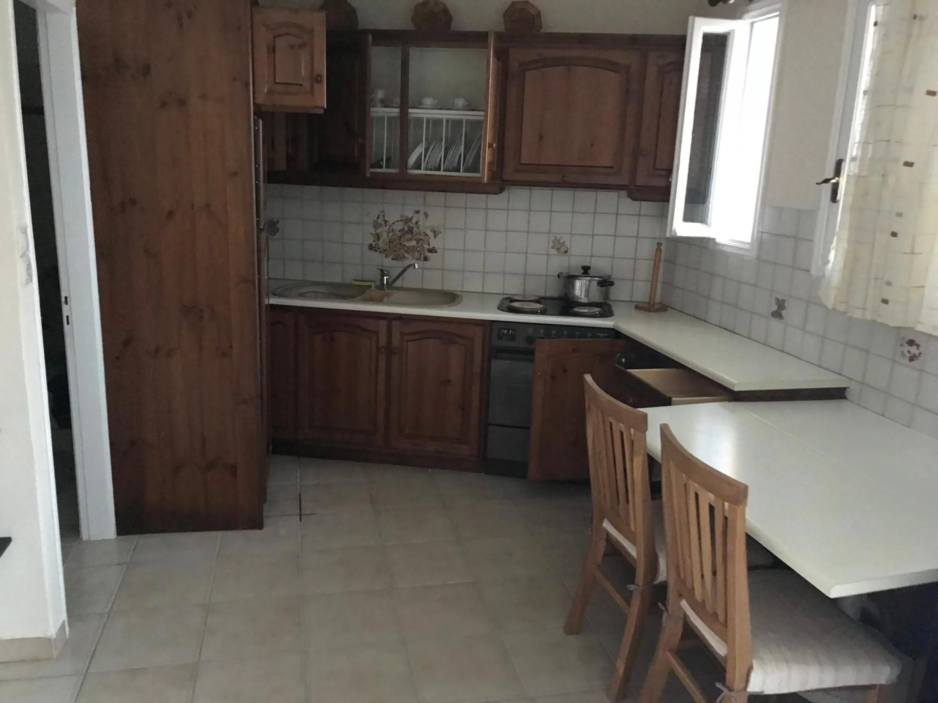 Kitchen or kitchenette in Ionio Hotel