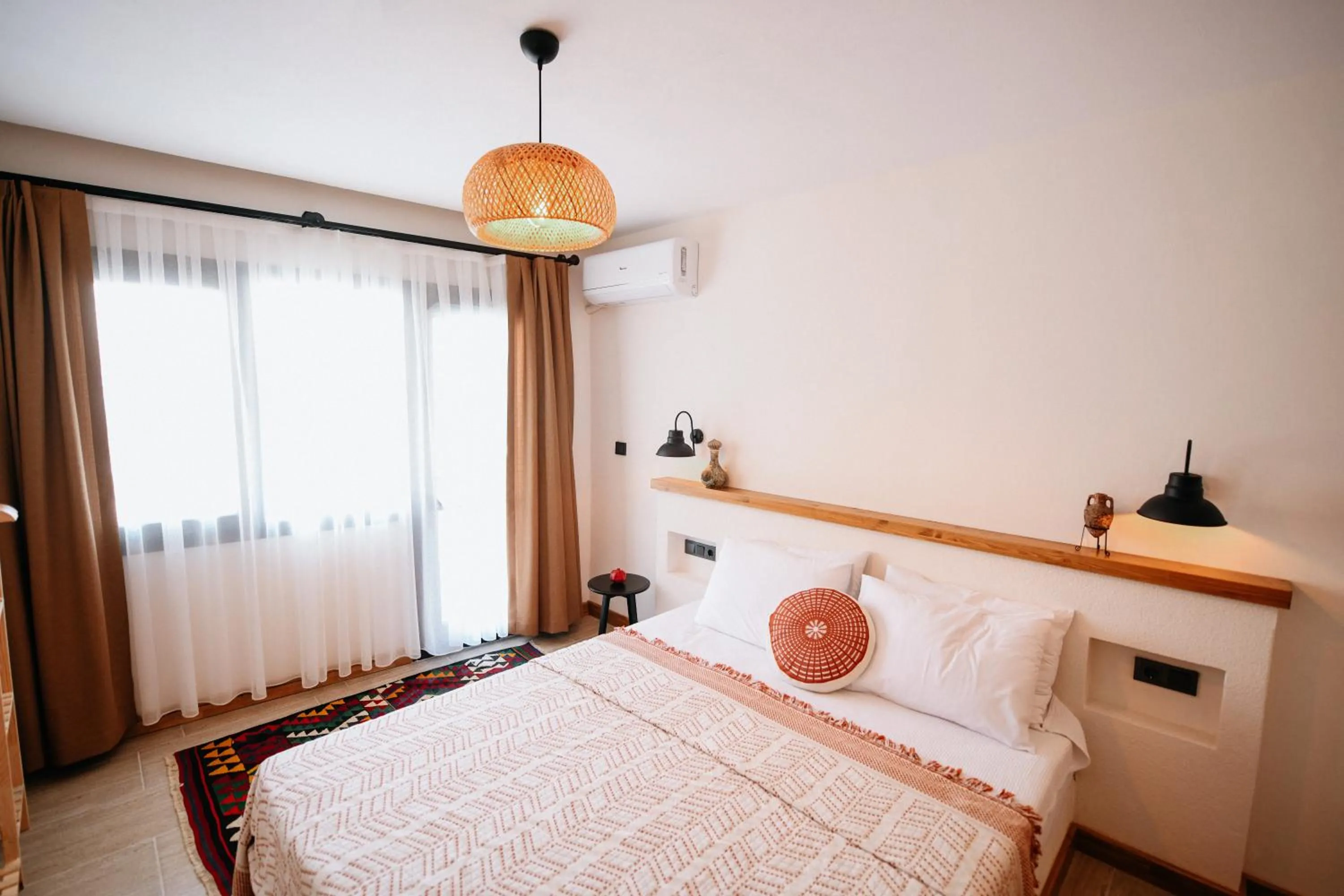 Bed in Kallinos Boutique Hotel