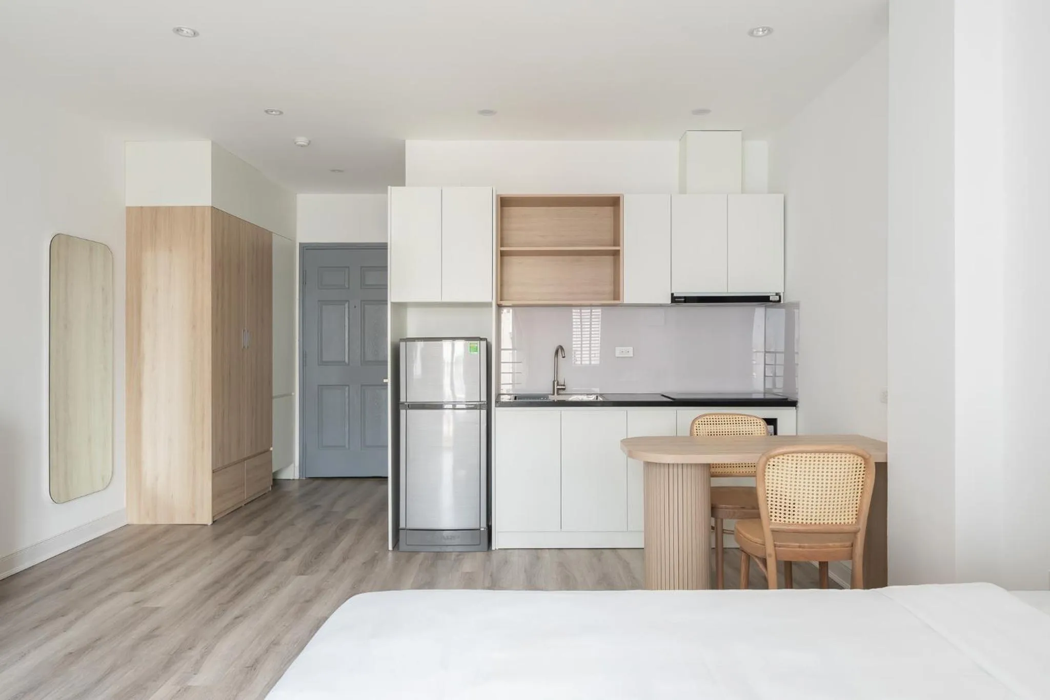 Kitchen or kitchenette, Bed in Dom's Residence Hanoi