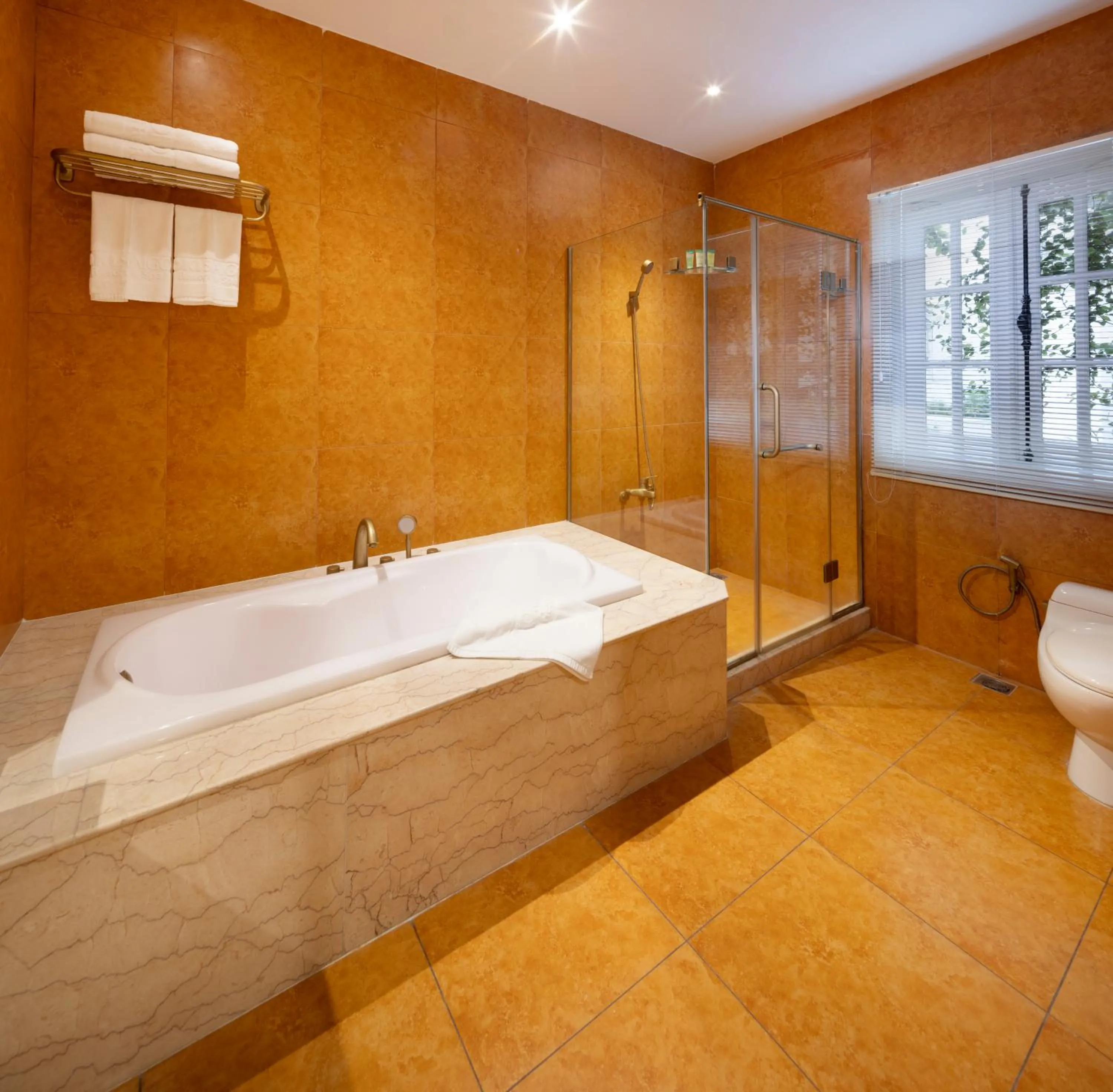 Toilet in Hidden Mansions Saigon Resort