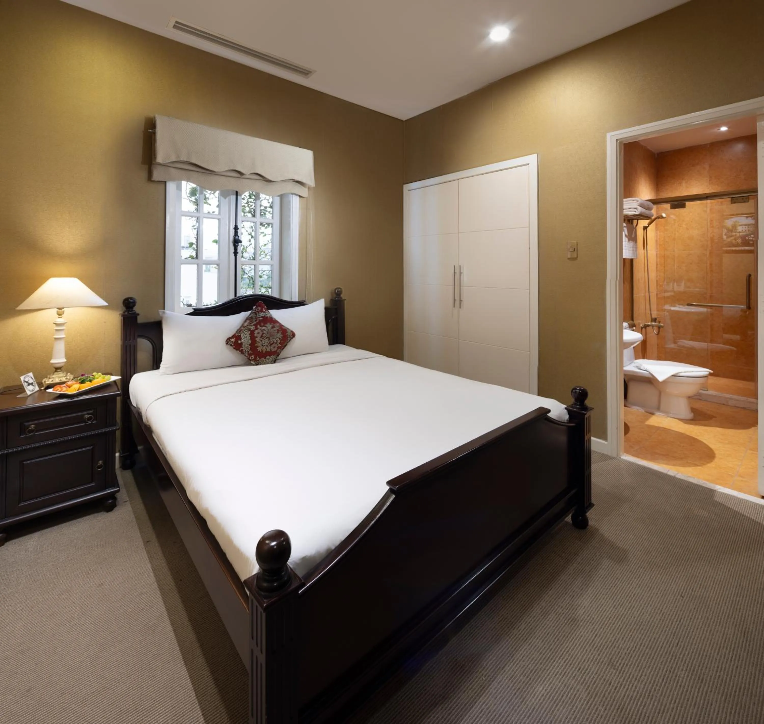 Bed in Hidden Mansions Saigon Resort